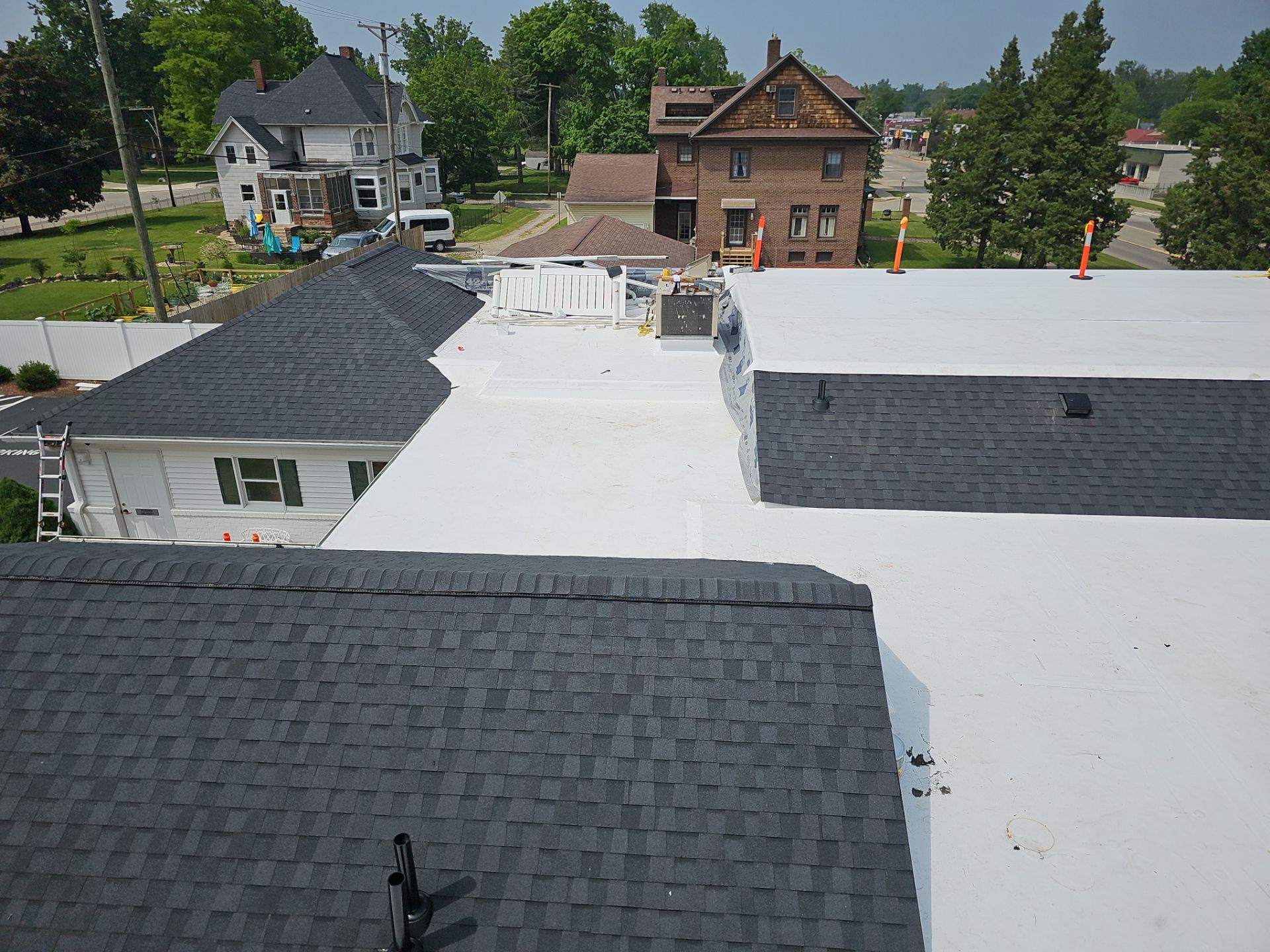 Commercial Flat and Shingled Roof Project by 42 North Construction, LLC.