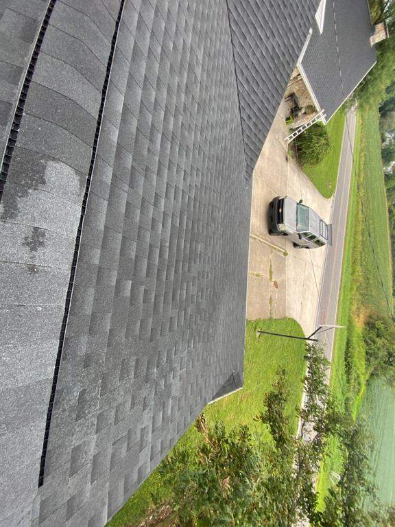 Storm damage roof replacement by Nitro Roofing and Construction