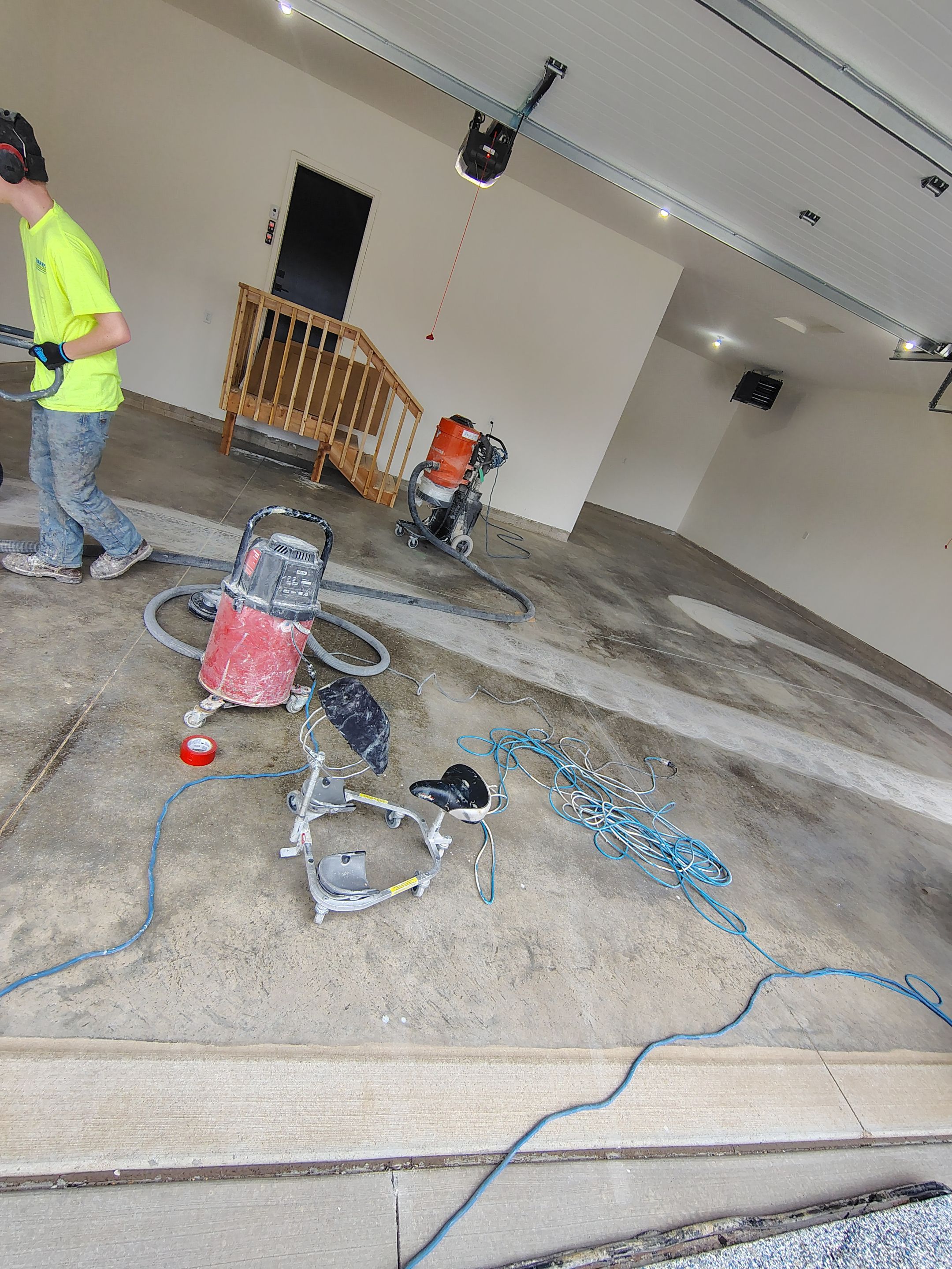 Sioux Falls Garage Floor Transformation with Gray Decorative Flake Coating by Select Painting, Coatings & Garage Cabinets
