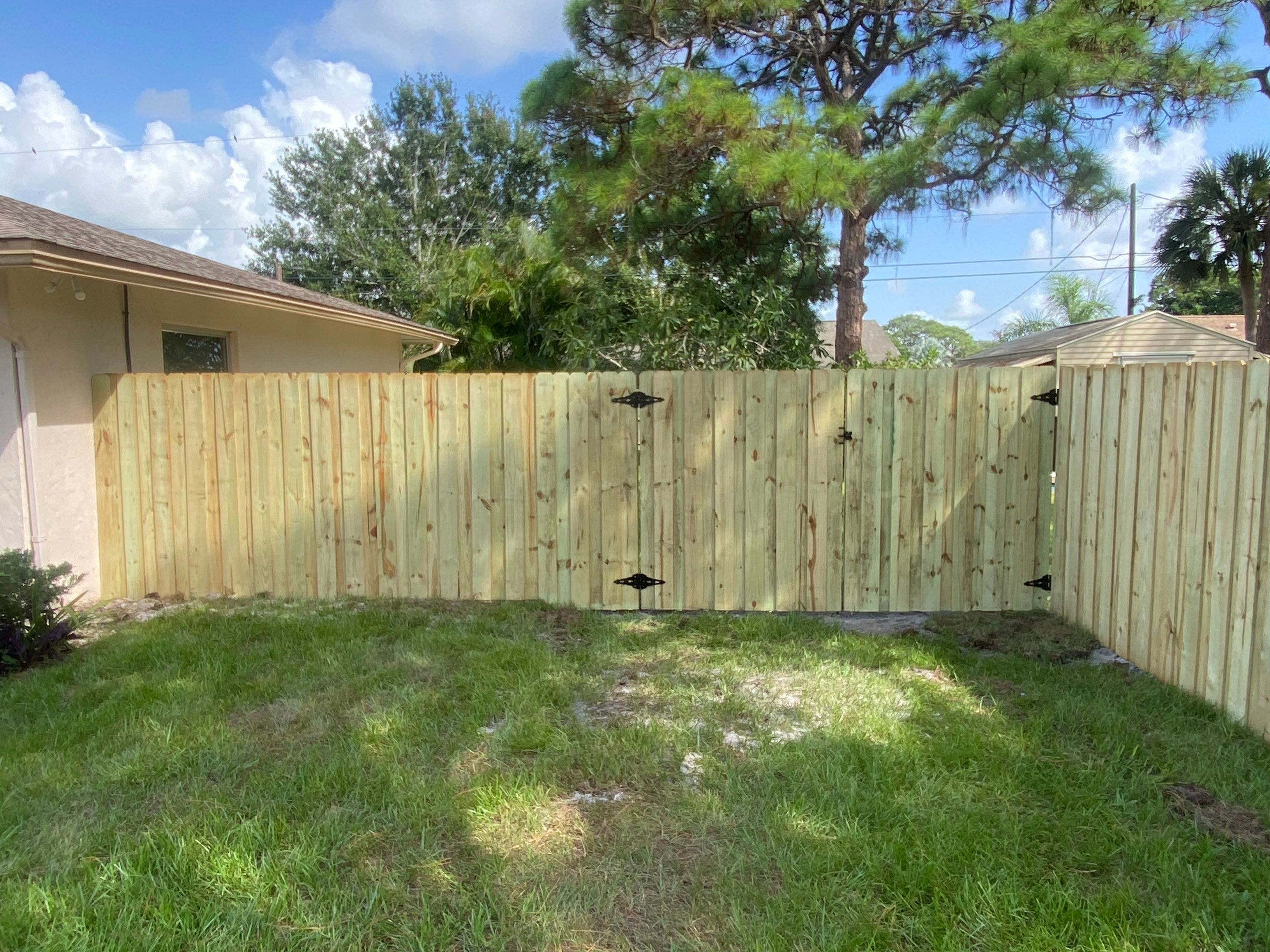 Wood Fence Installation using Board on Board Wood Fence by Asap fence and gates, LLC
