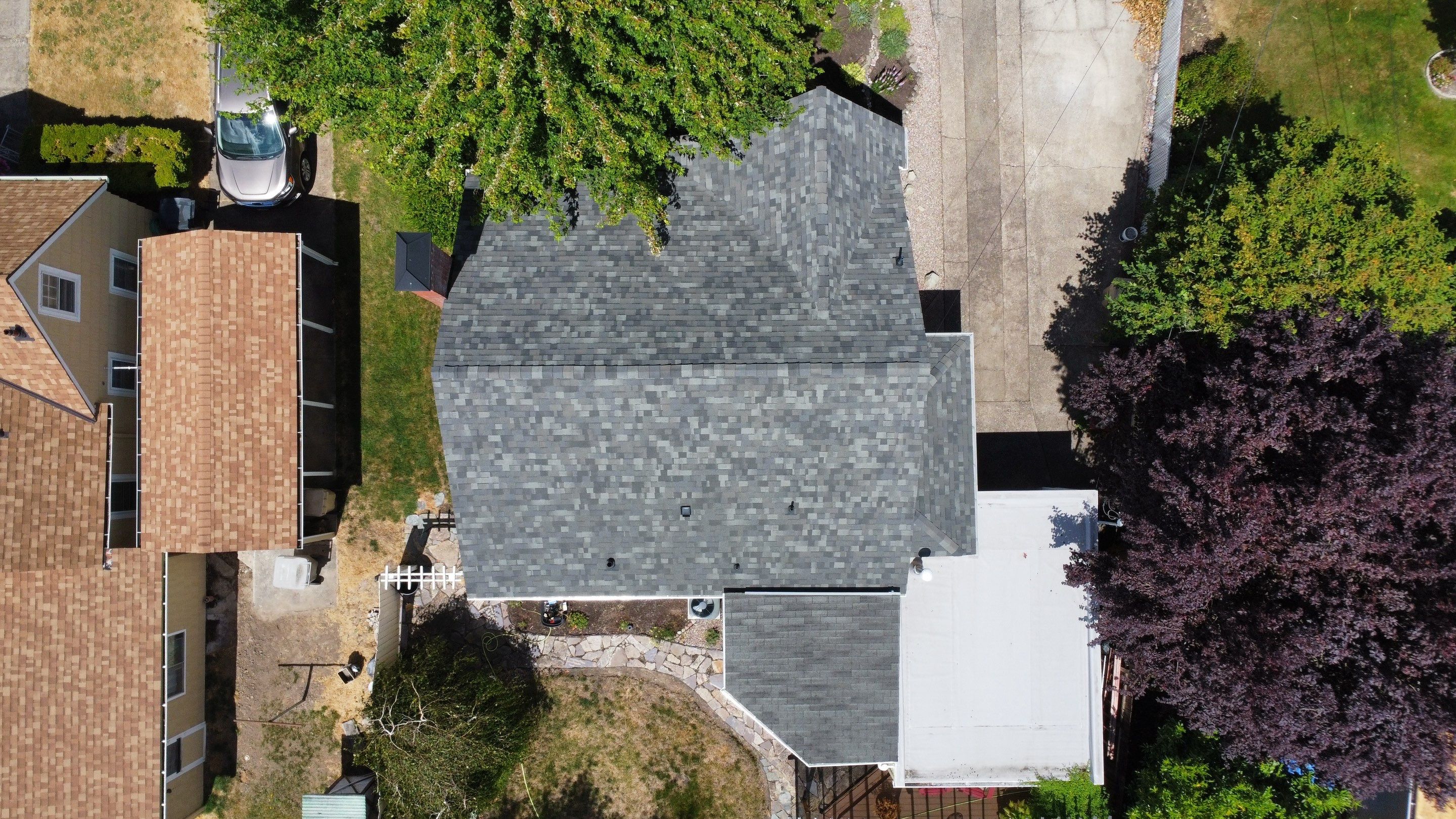 Residential Roof Installation with Added Insulation Barrier  using Malarkey Vista AR Shingles (Color: Storm Grey) by Orezona Building & Roofing Company, Inc.