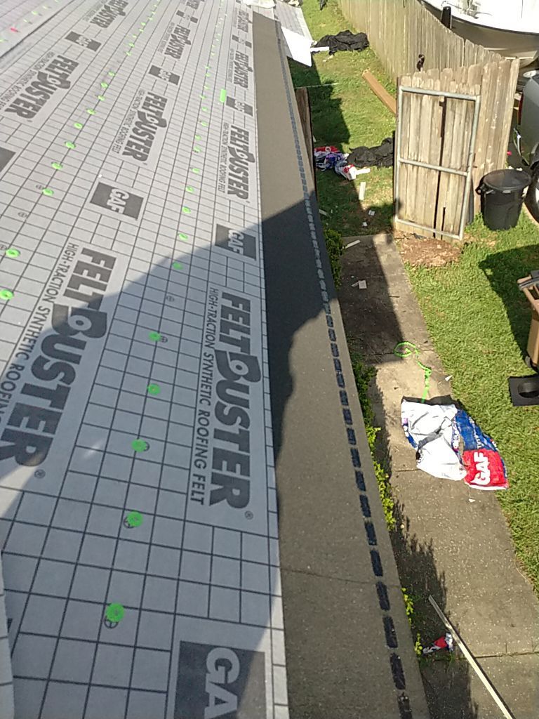 Residential Roofing Installation using Roof Replacement by American Roofing & Construction LLC