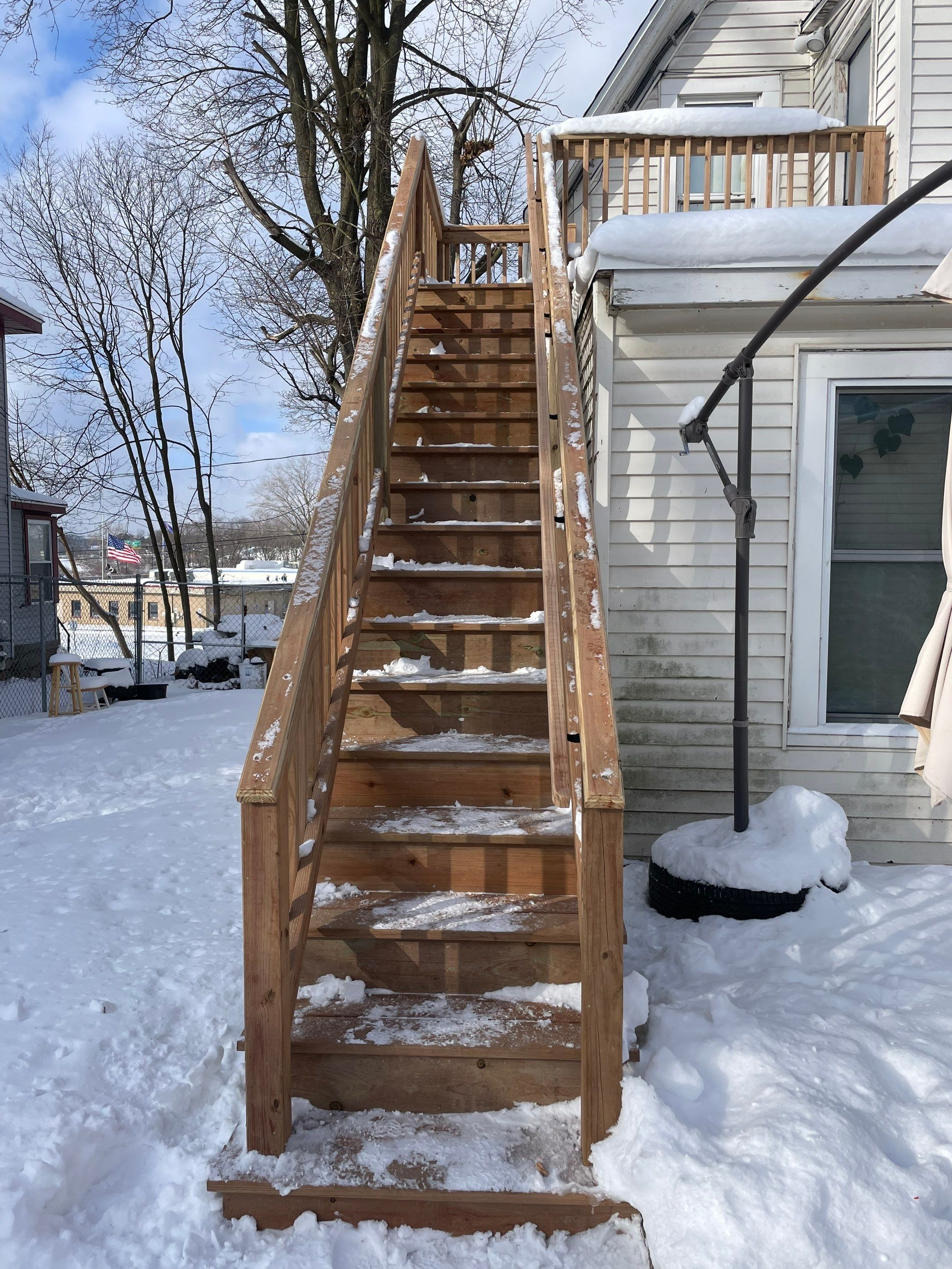 Deck Installation using Treated Lumber by Avalon Roofing and Exteriors