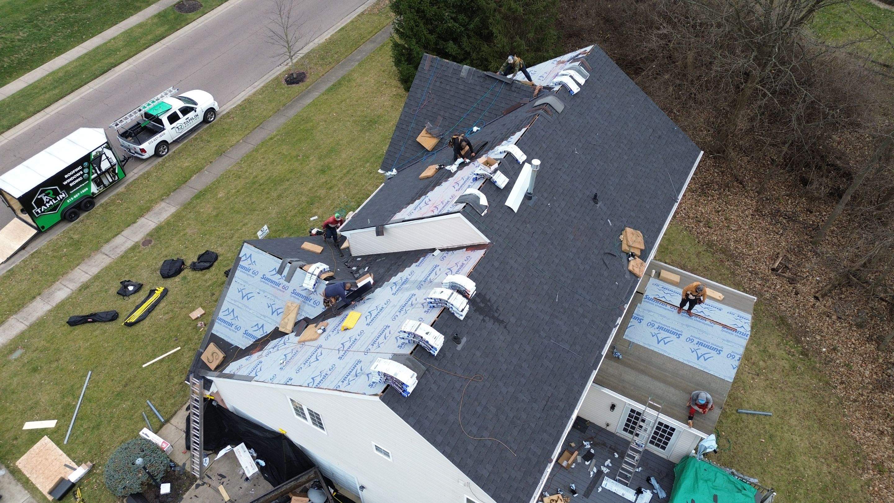 Walden Ponds - Pristine Black and Hydro Flo Gutter Guards by Tamlin Roofing