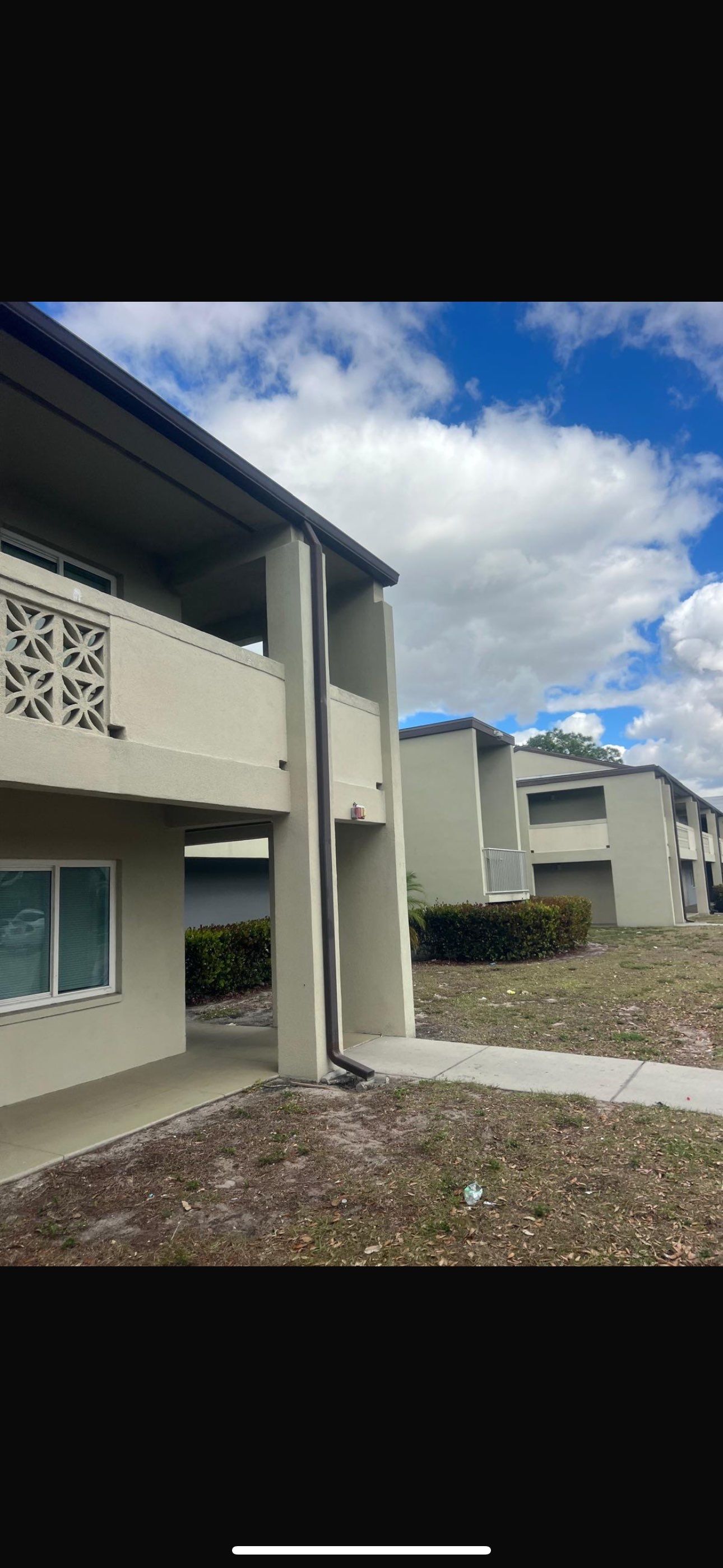 Bronze Downspouts Installation in Fort Myers FL by Gutter Professors