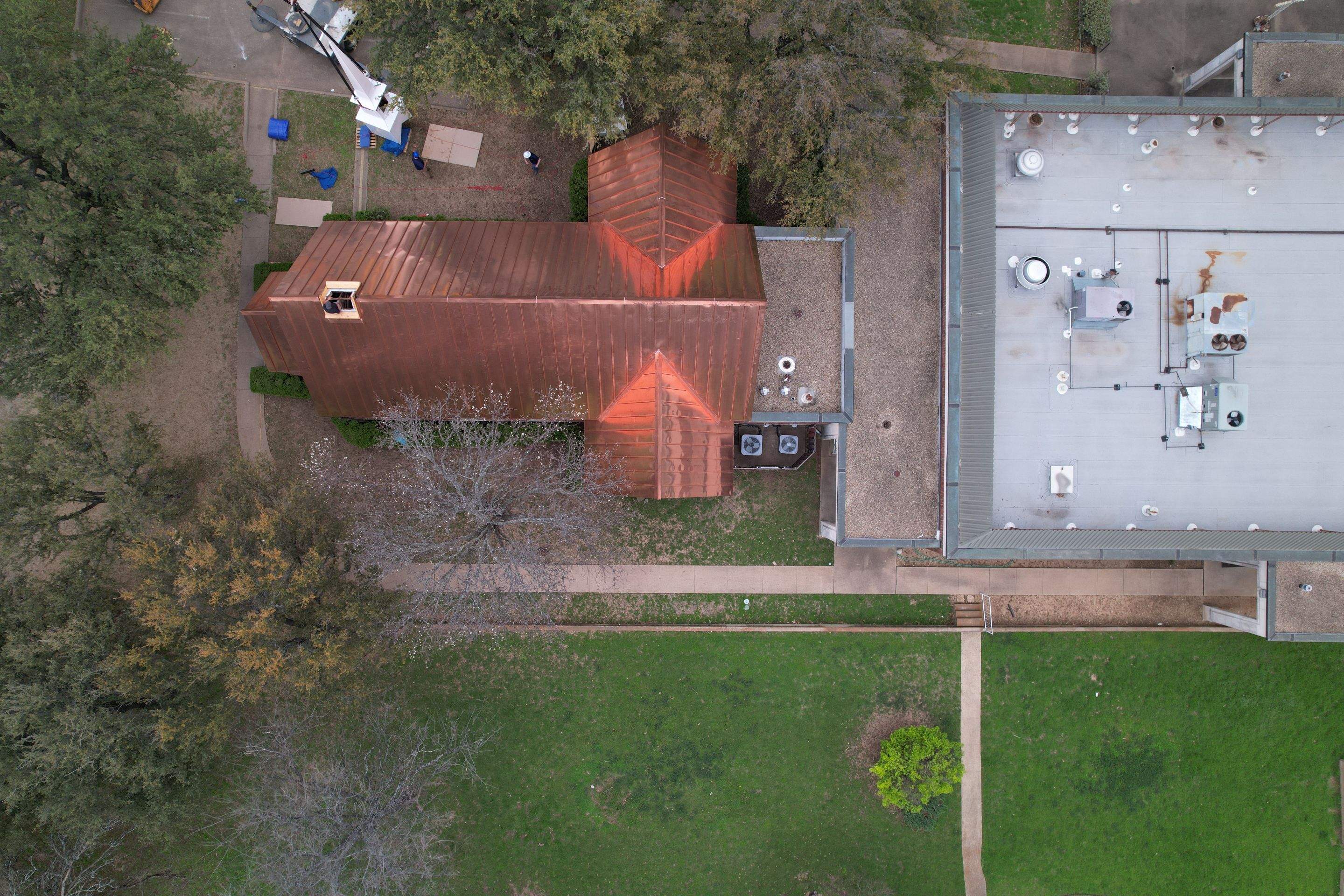 Custom Copper Standing Seam Roofing System  by Springtree Restoration 