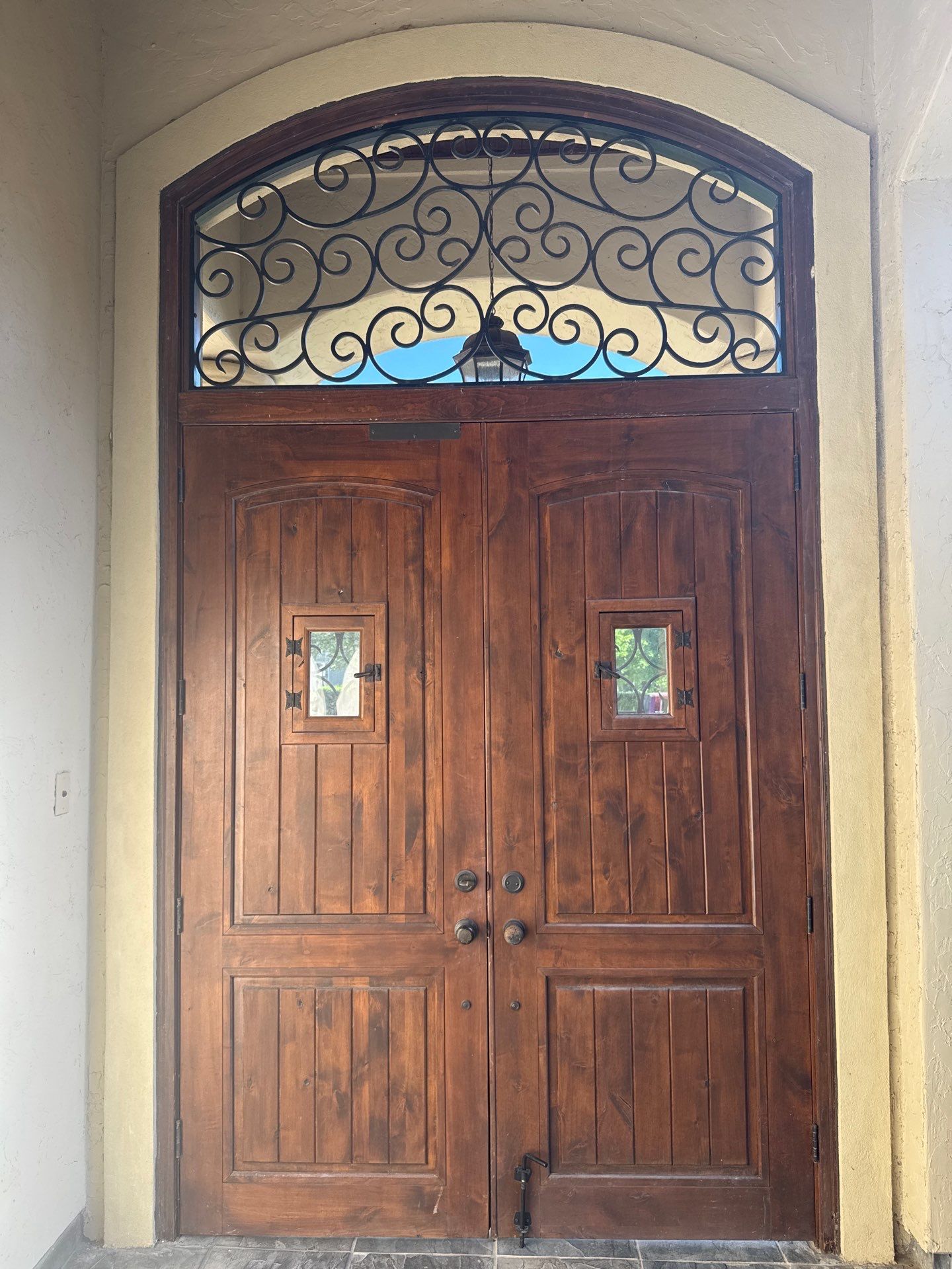 Complete Exterior Painting and Stucco Refinishing in Spring by Rolling Nations