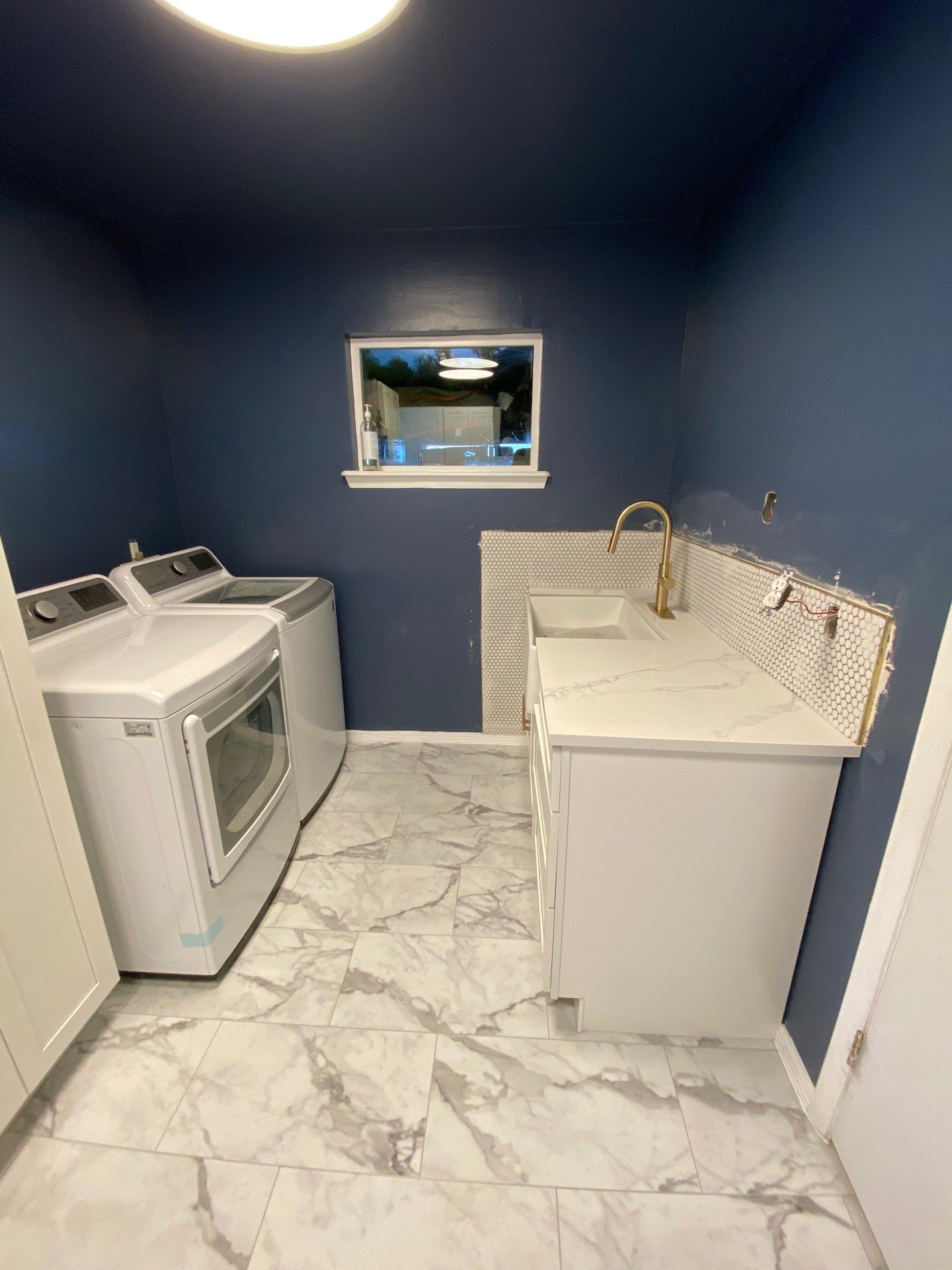 Laundry Room  by SC Remodeling