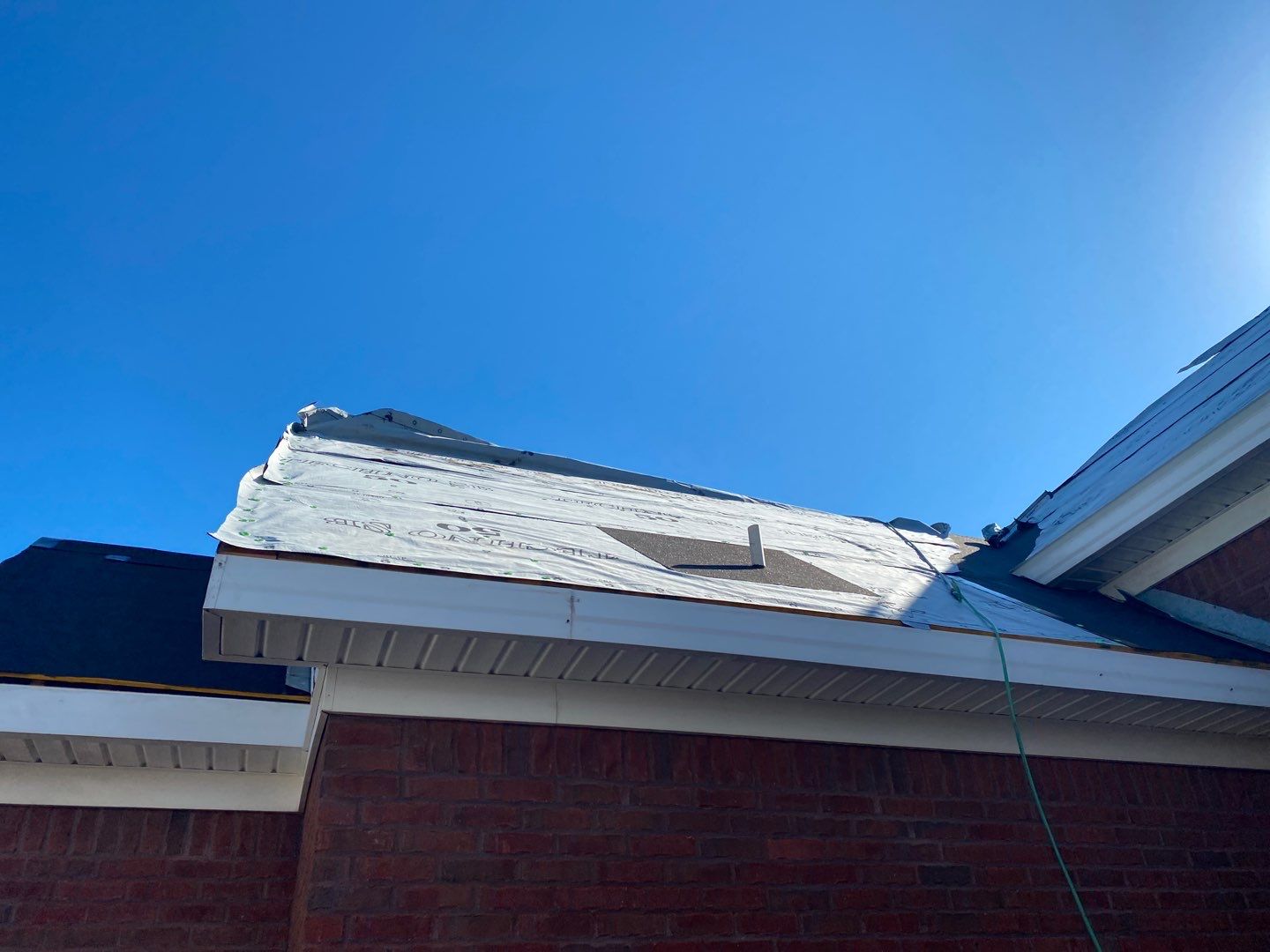 Residential Roofing Installation using Roof Replacement by American Roofing & Construction LLC