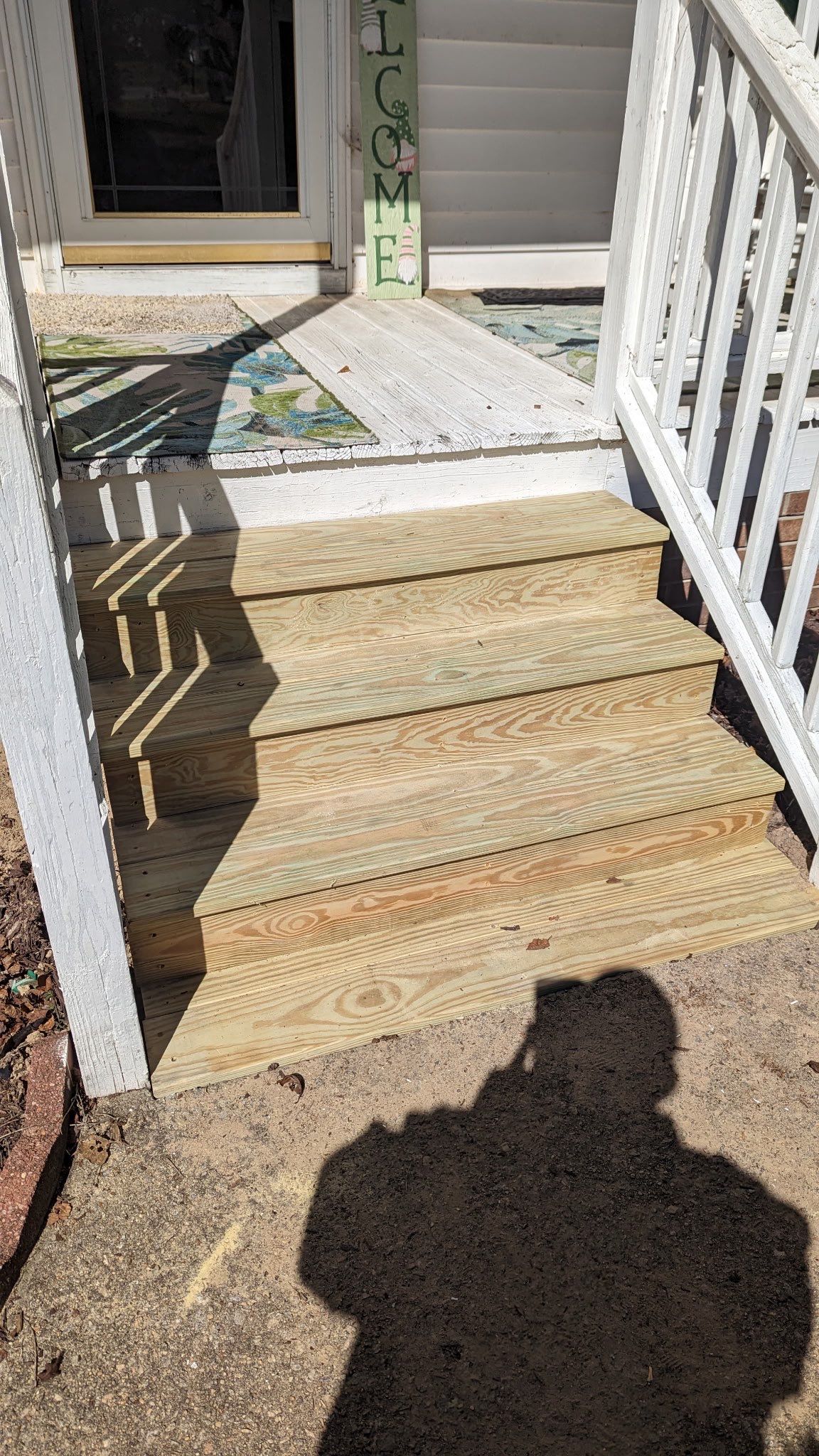Pressure-Treated Wood Stair Replacement and Trim Work in Willow Spring by The Remodeling Company