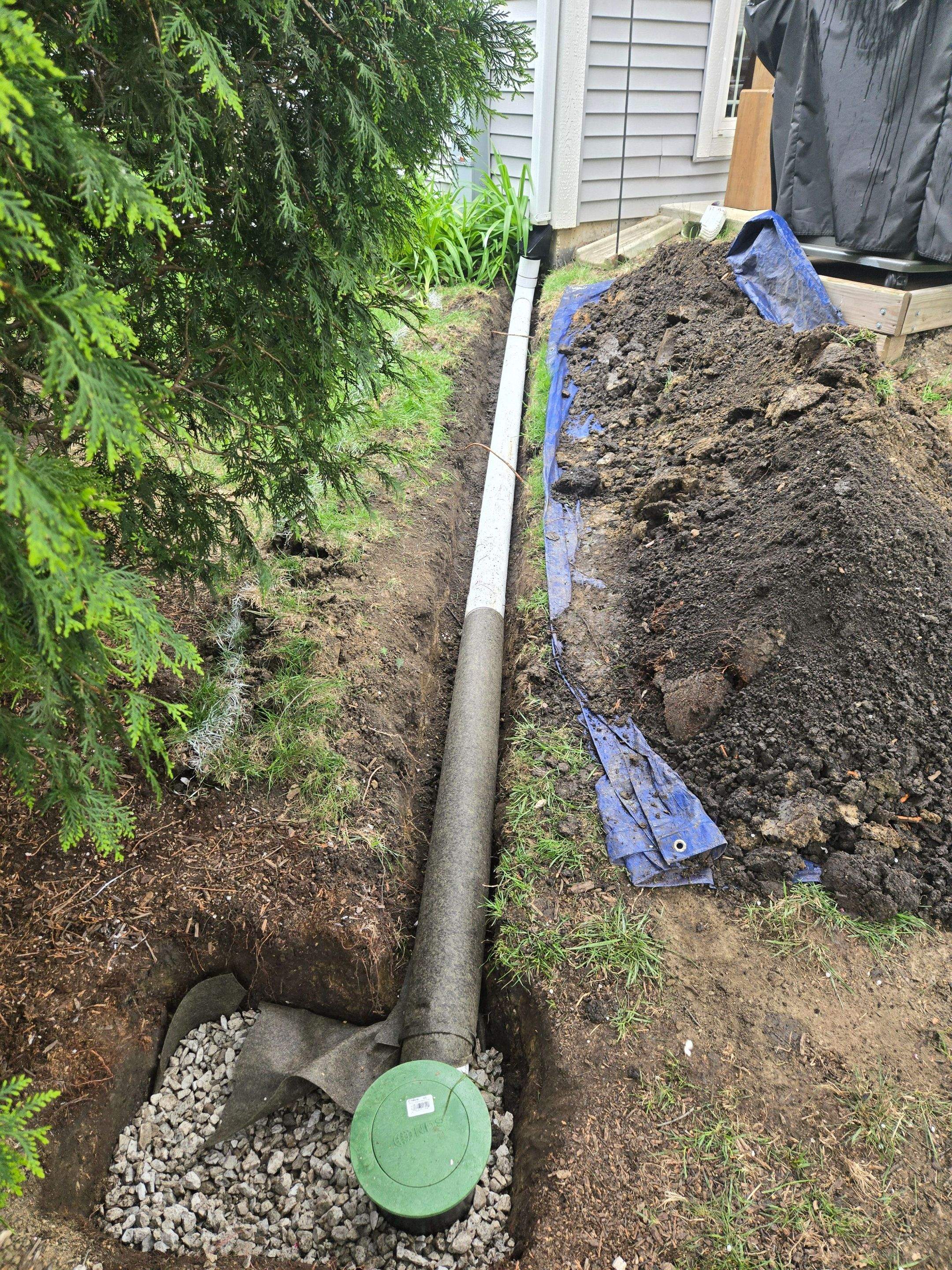 Downspout Discharge Installation & Yard Regrading by Allied Water Services