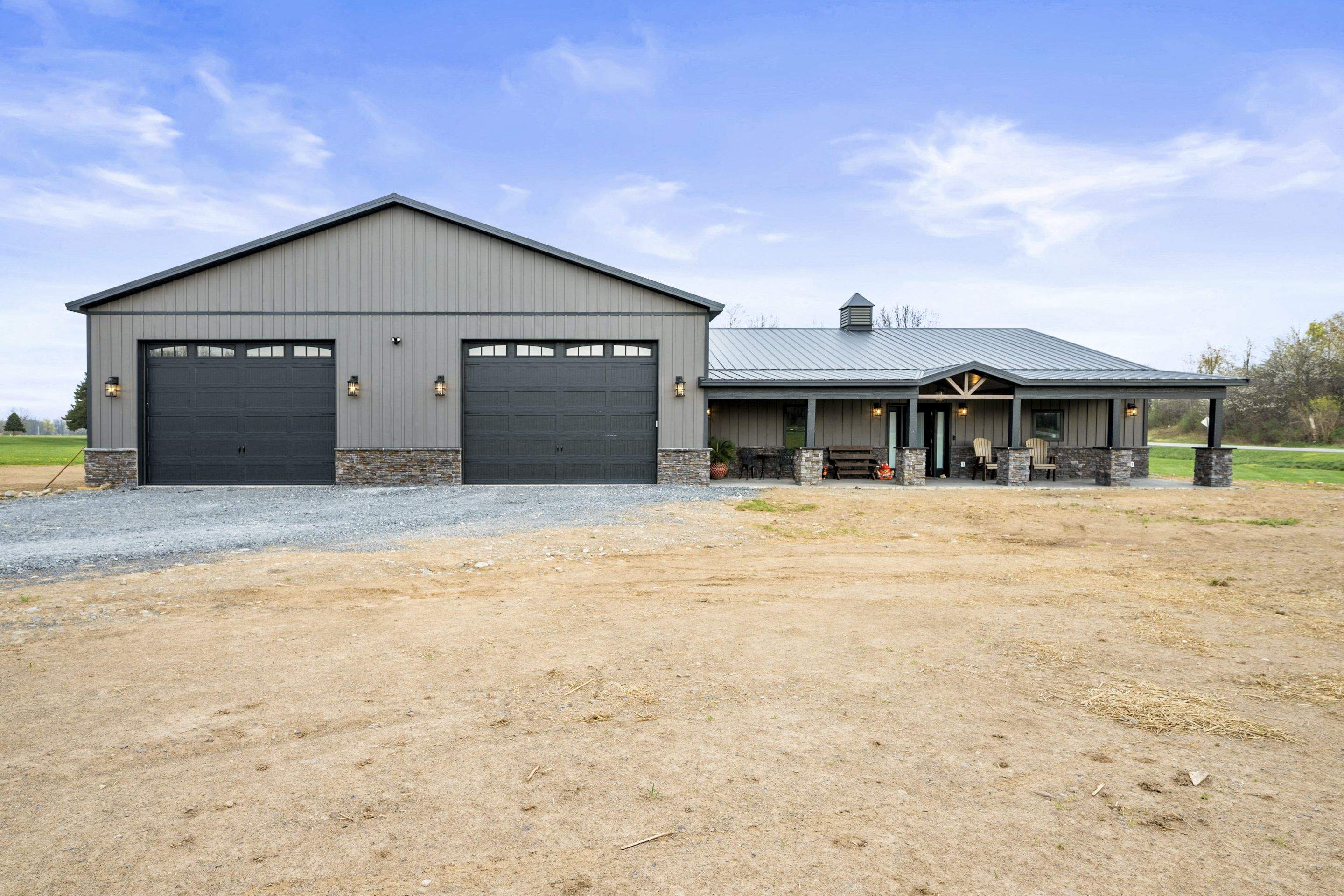 Barndominium  using Textured Board & Batton by Horst Custom Homes 