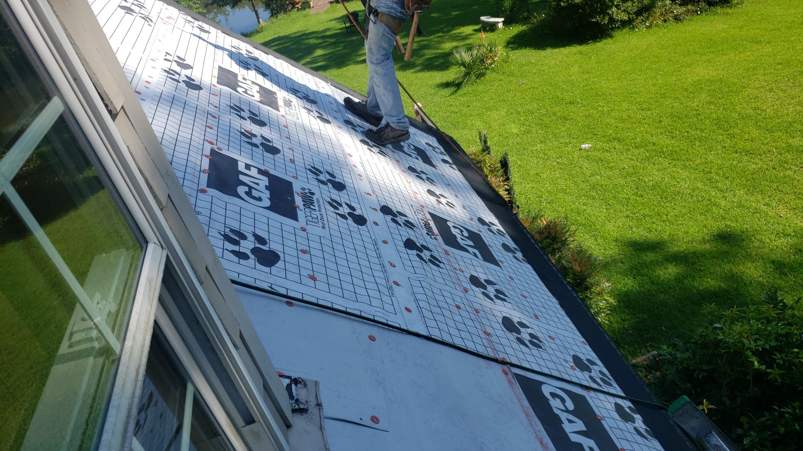 Residential Roofing Installation using Roof Replacement by American Roofing & Construction LLC