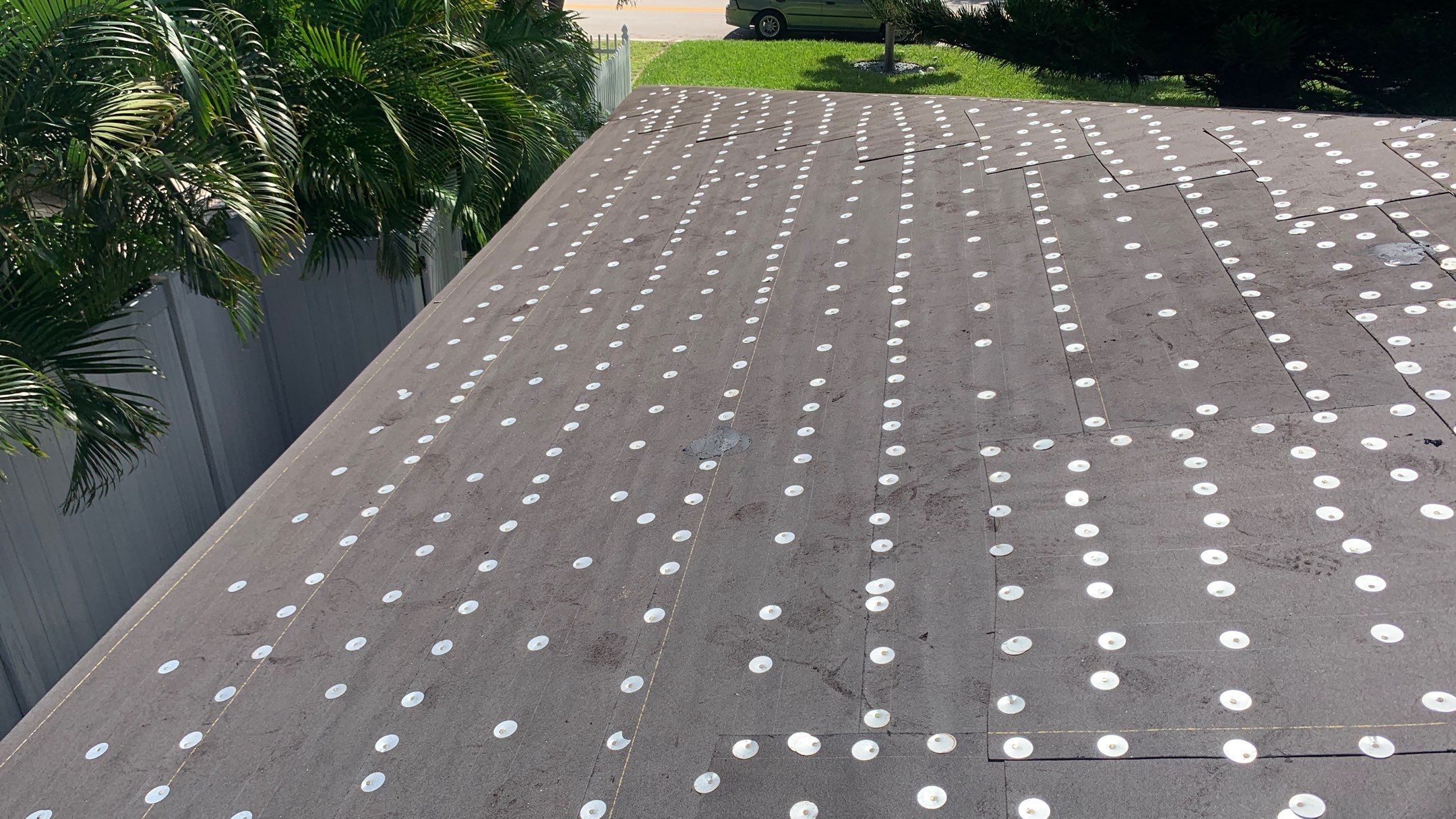 Residential Roofing Installation using 1" Nail strip metal roof by BLUES BROTHERS ROOFING