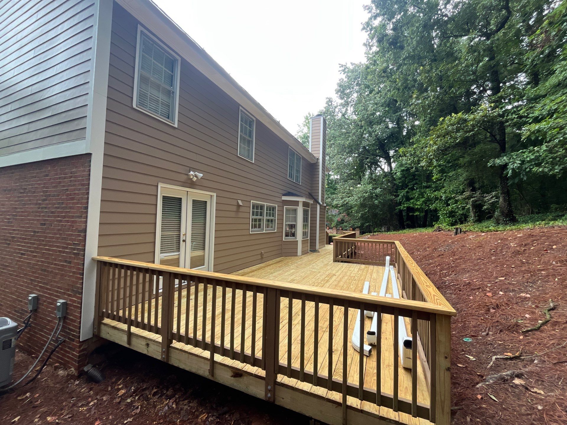 James Hardie Siding Installation, Rotten Wood Replacement, Porch Repairs, and Deck Resurfacing in Smyrna, GA by Nelson Exteriors 