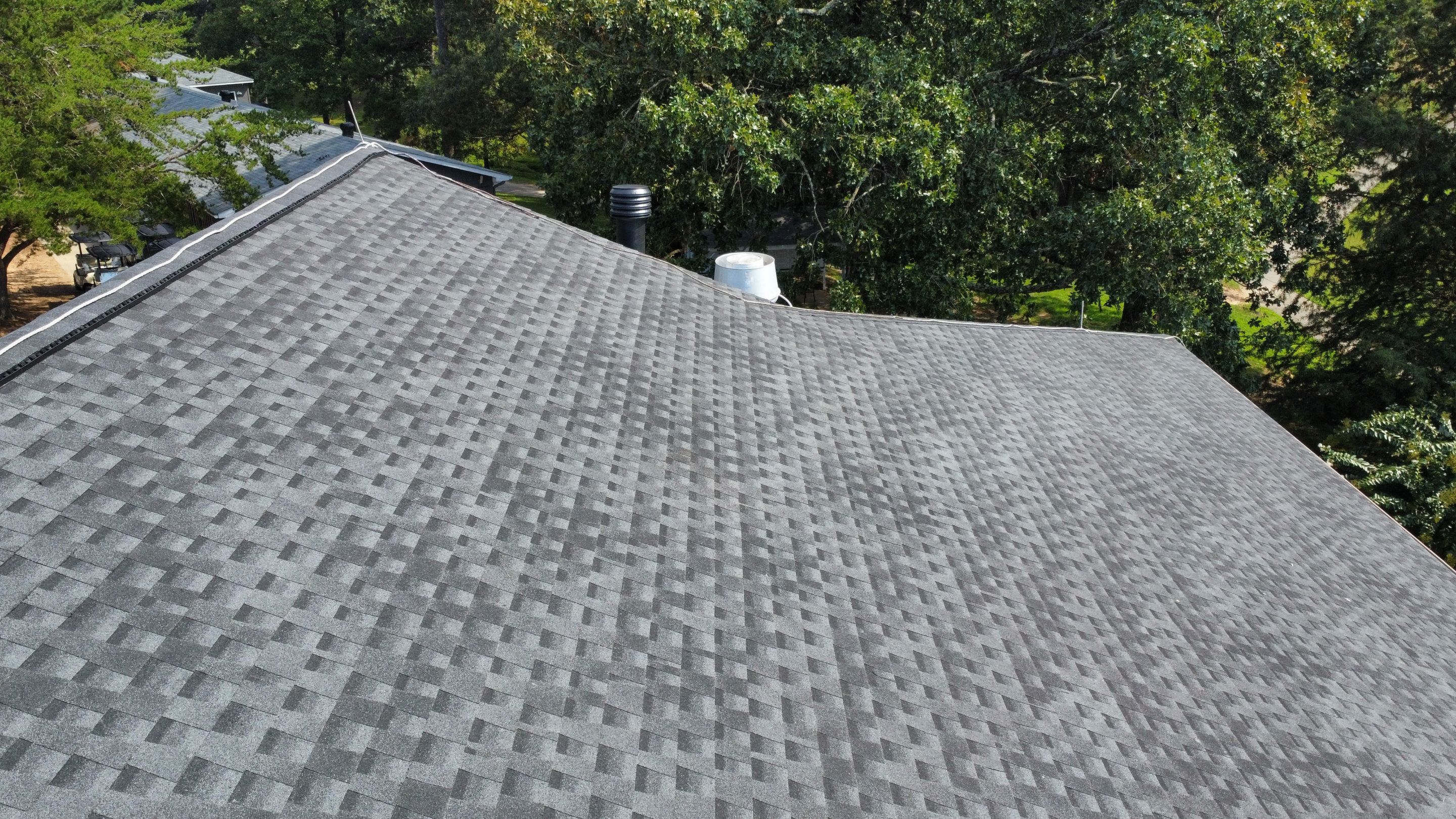 Country Club Roofing Installation by Reset Roofing