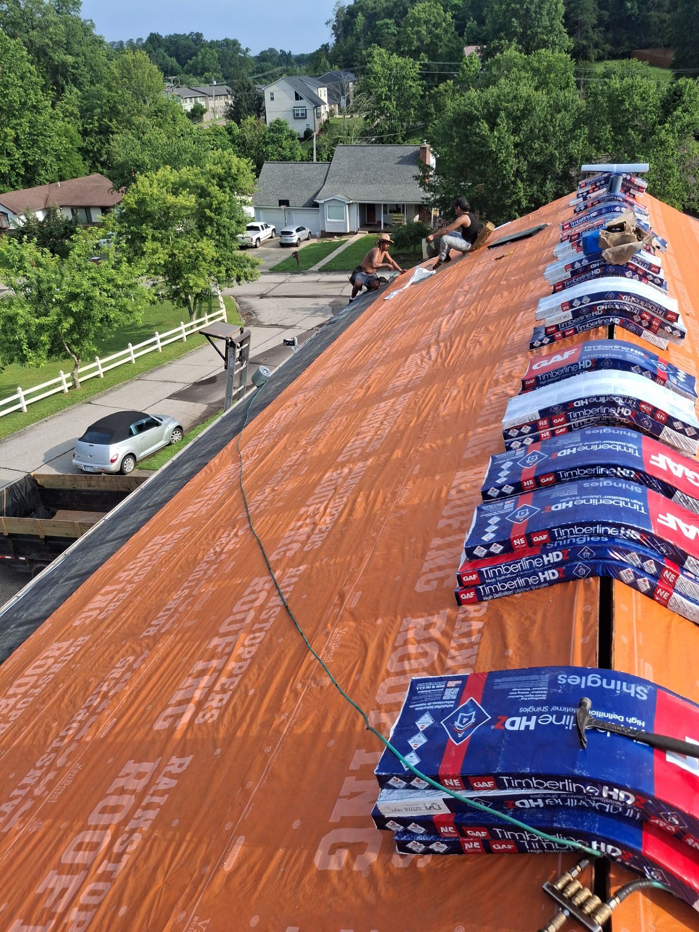 Residential Roofing Installation using GAF Timberline HDZ Oyster Grey by Rainstoppers Roofing