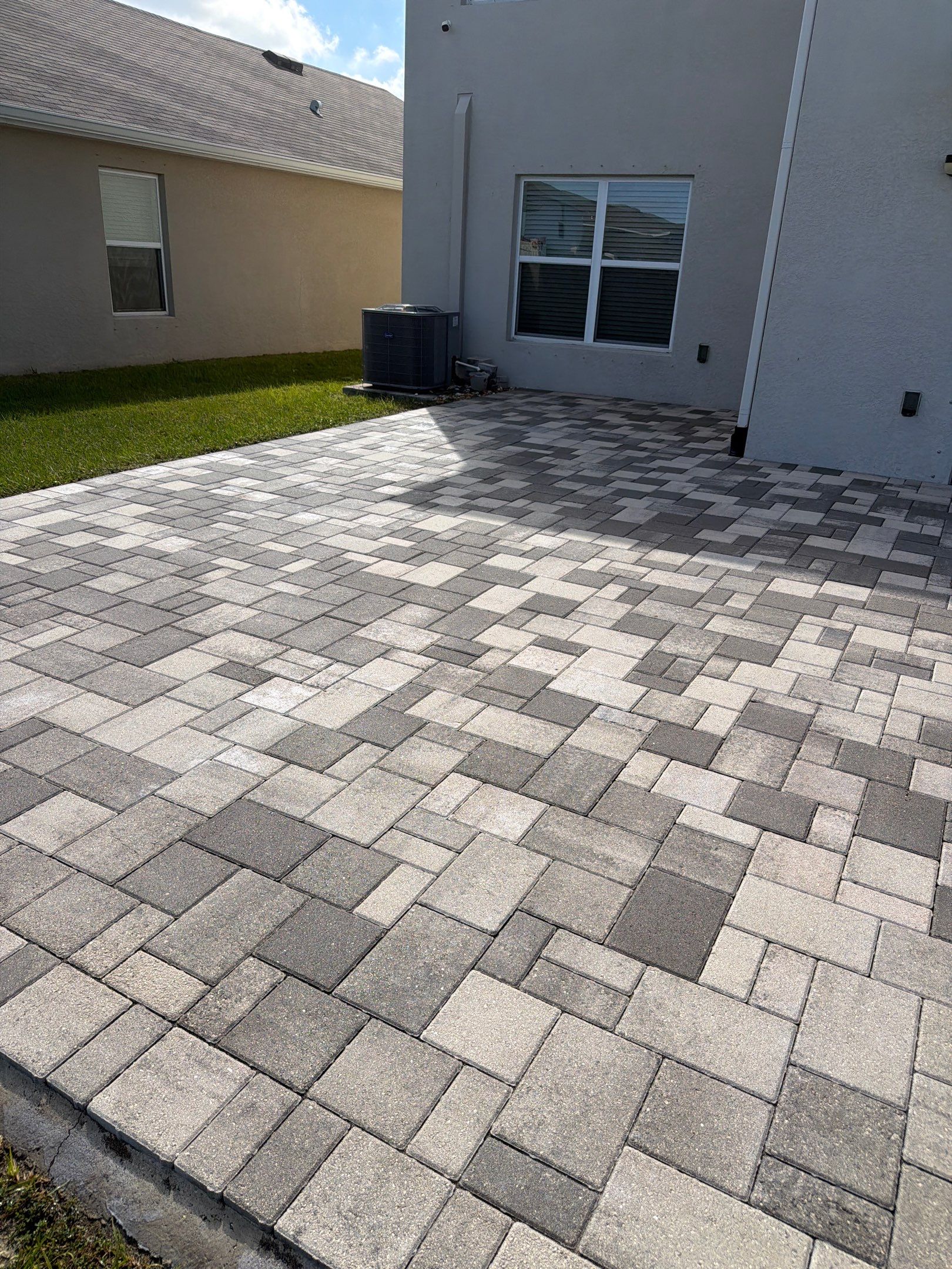 Paver Sealing and Restoration for Large Multi-Toned Patio in Wimauma by Supreme Paver Experts