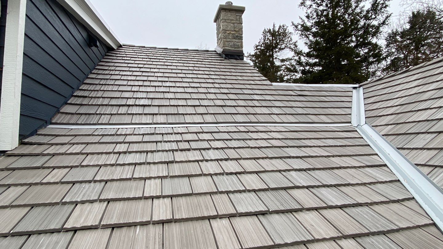DaVinci Roof Installation with Snow Guards in Oconomowoc Lake by Custom Installations