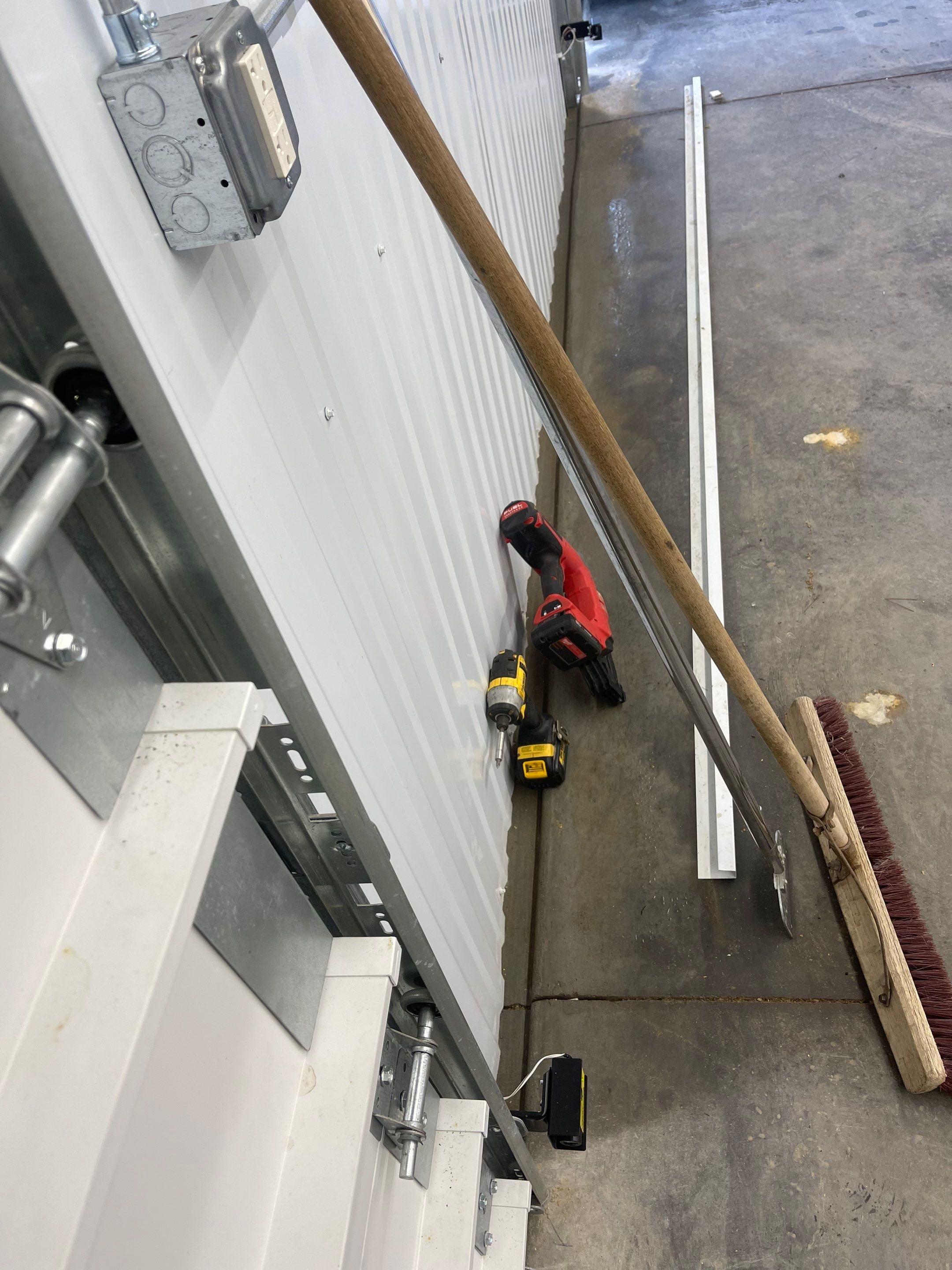 Garage using Pecan by Select Painting, Coatings & Garage Cabinets