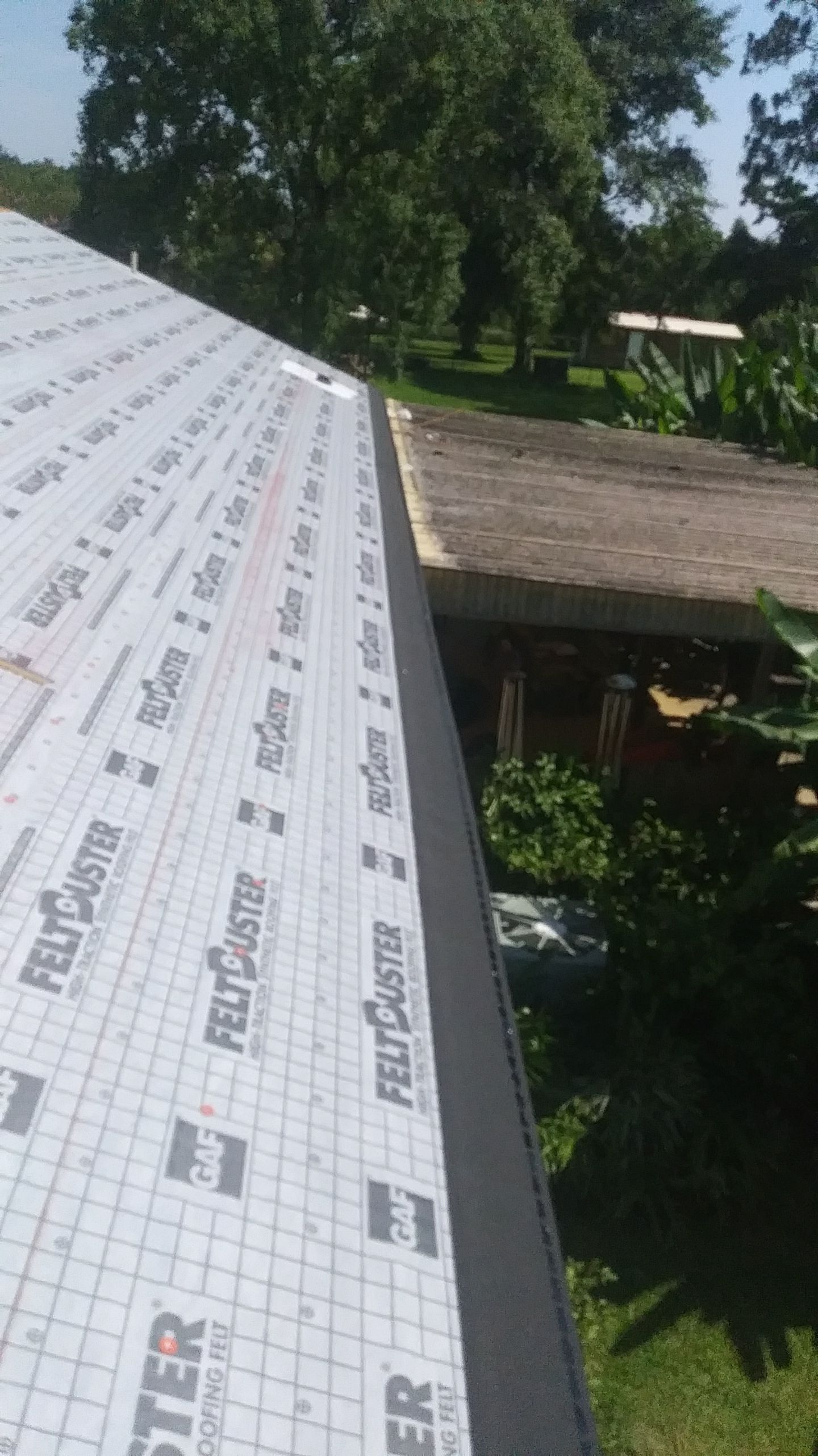 Residential Roofing Installation using Roof Replacement by American Roofing & Construction LLC