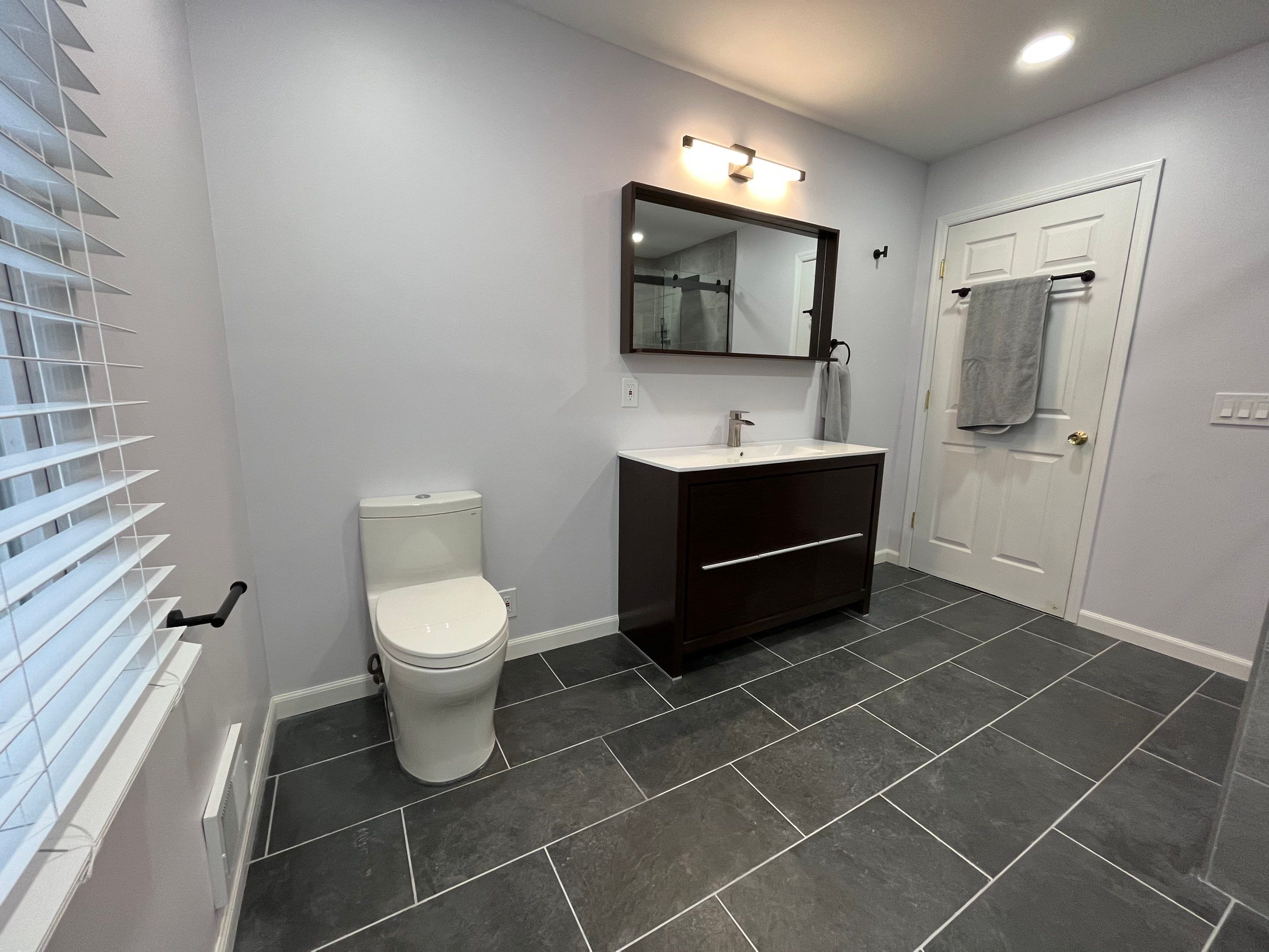 Bathroom Remodel using Tile by Home Concepts Construction