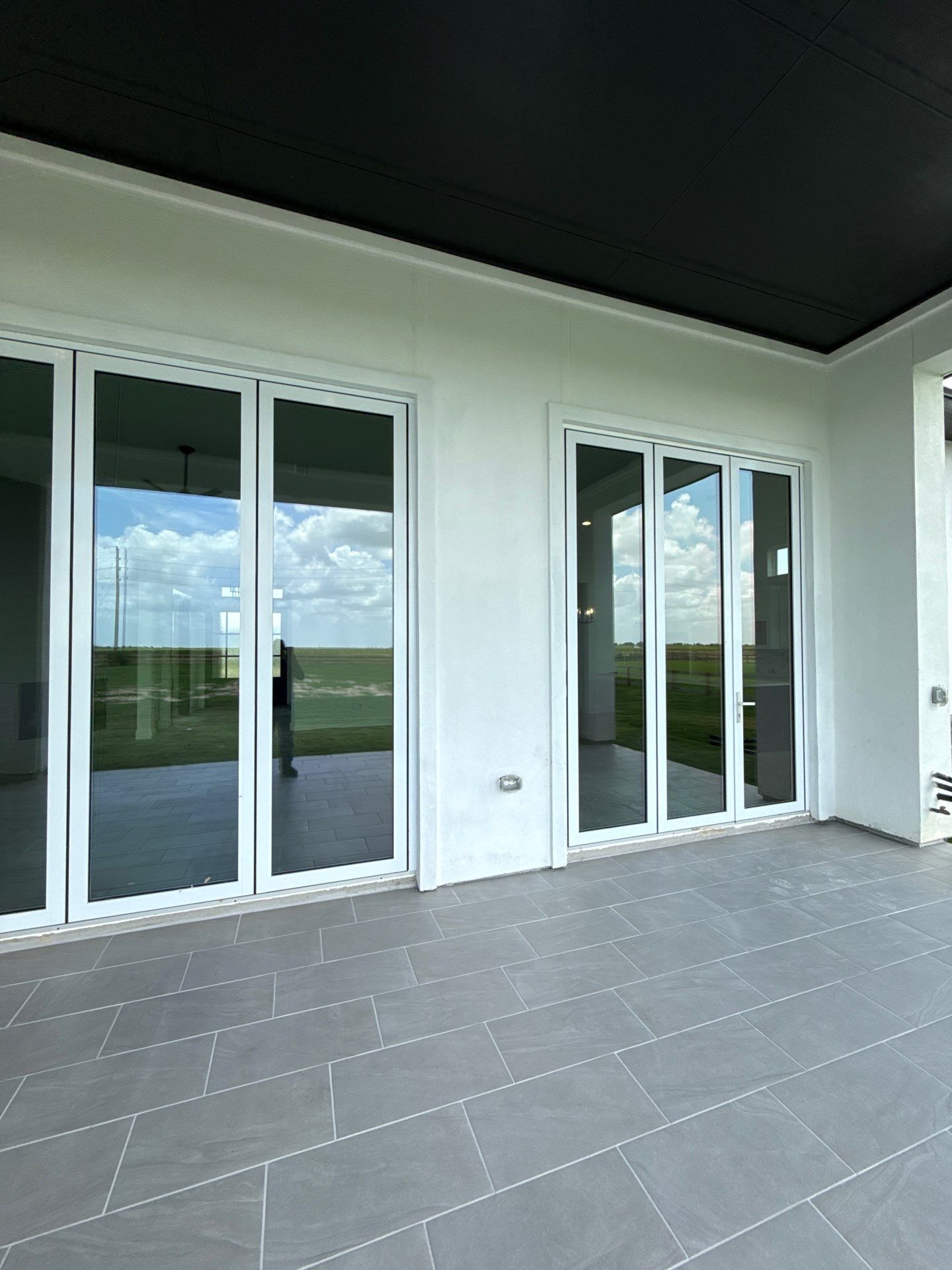 Waller Sophistication: Snowbound Color Stucco with Limestone Accents. by Apex Conventional Stucco Llc