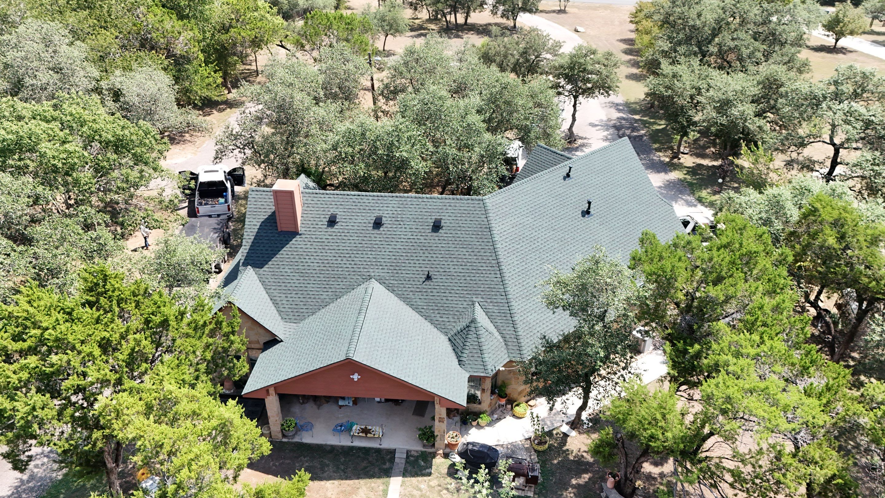 Residential Roof Replacement using GAF - HDZ - Hunter Green by Action Exteriors Austin