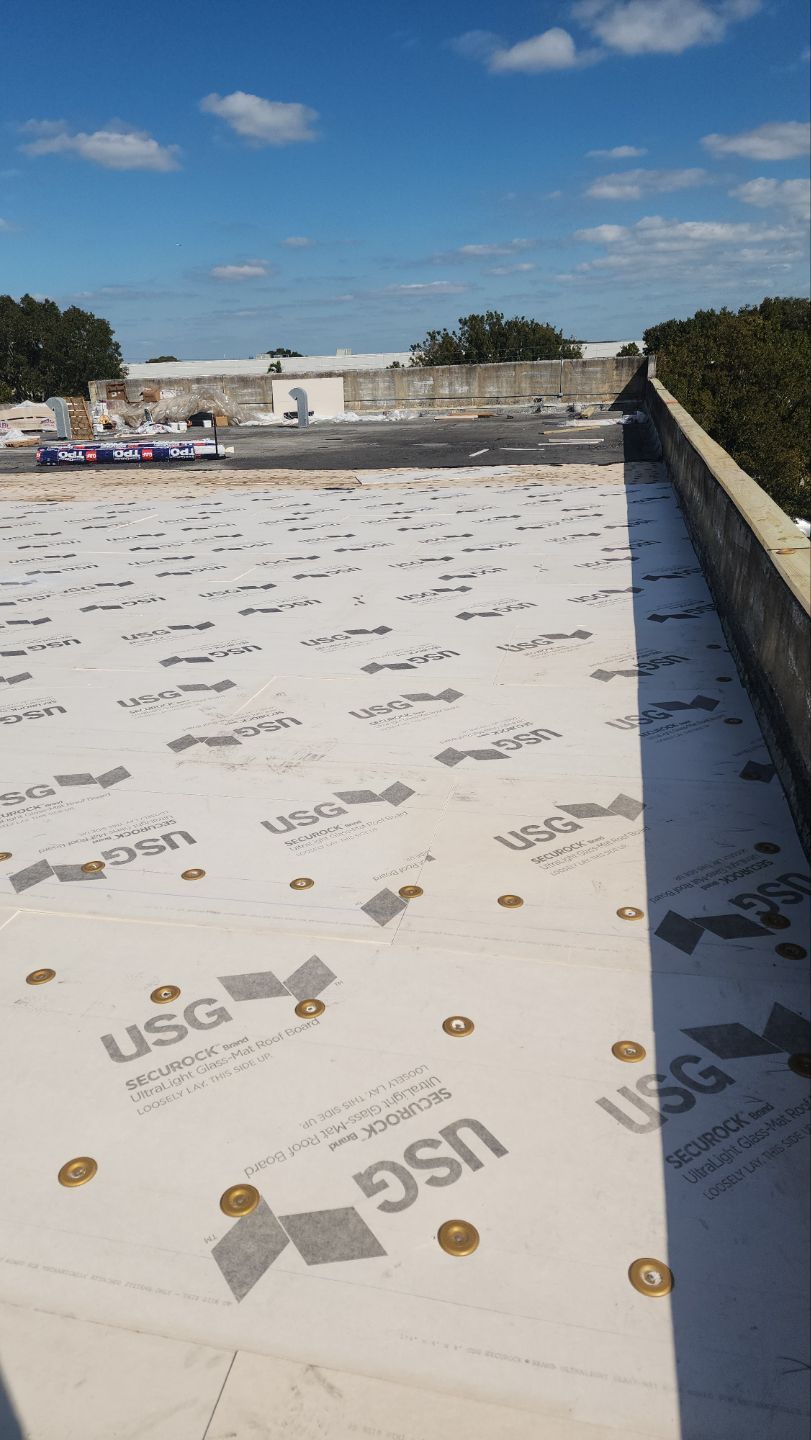 White TPO Membrane Roof Replacement at Doral Commercial Building by AJF ROOFING INC