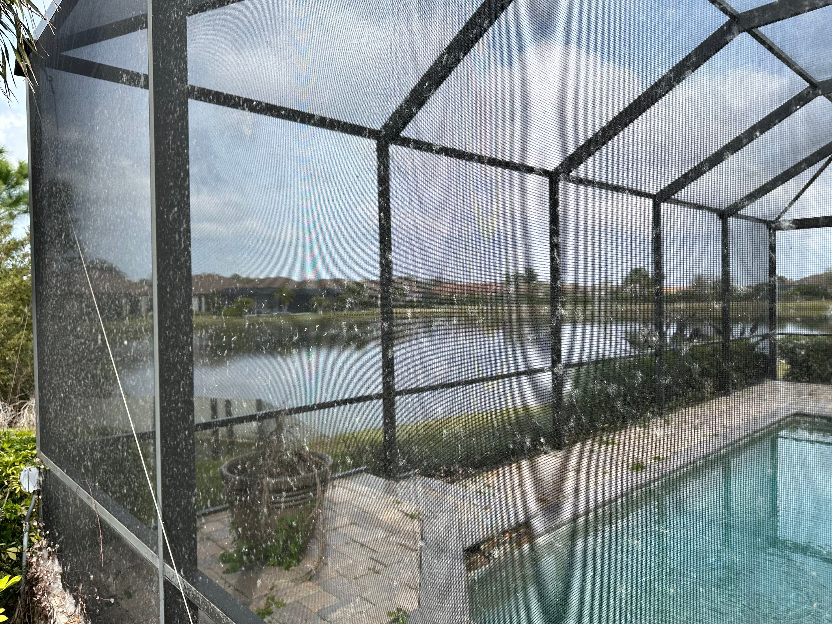 Concrete Tile Roof, Paver Pool Deck, Screen Enclosure & Driveway Cleaning in Artisan Lakes Esplanade, Palmetto, FL | Sunshine AquaWash by Sunshine AquaWash