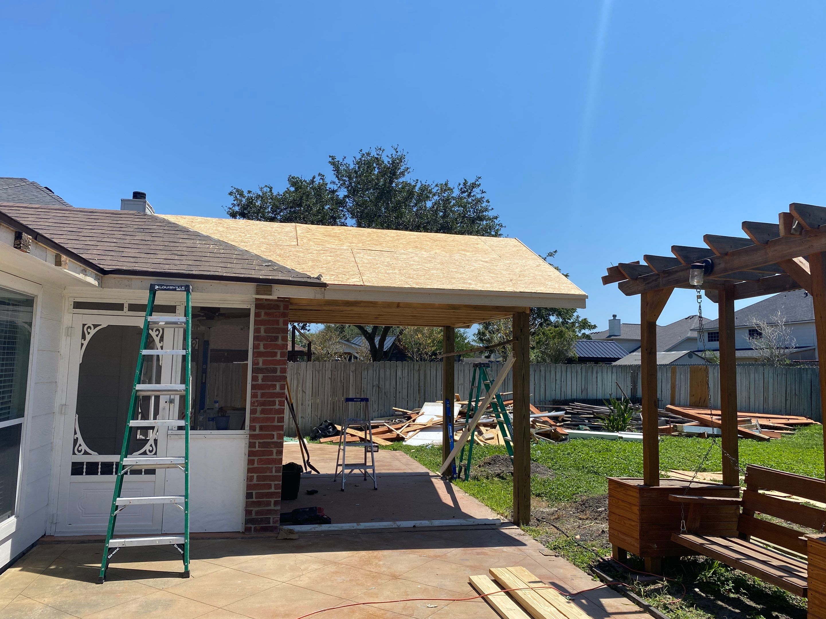Back Yard Shade by Bayfront Roofing and Construction