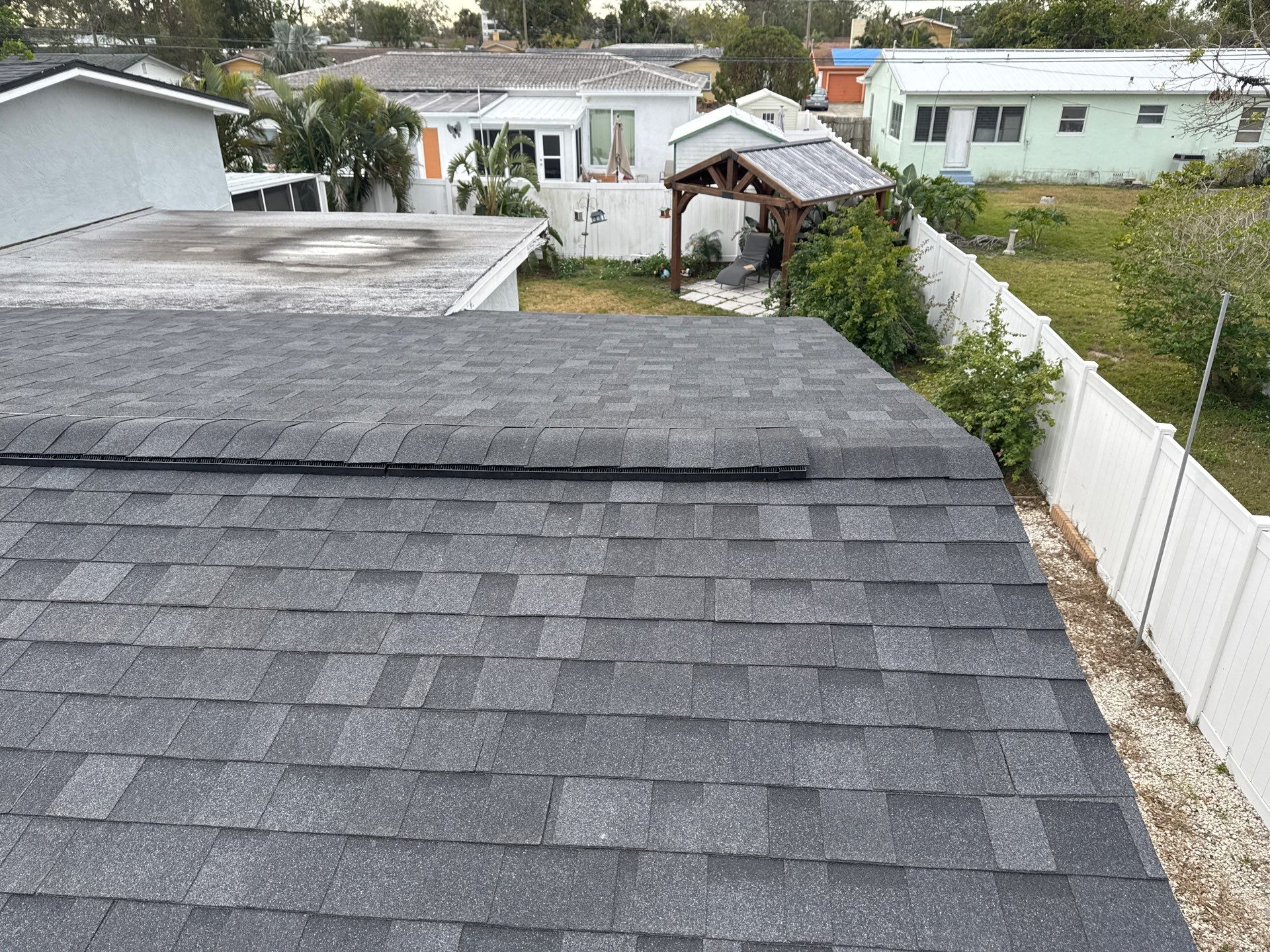 Estate Gray Shingles by Reimagine Roofing