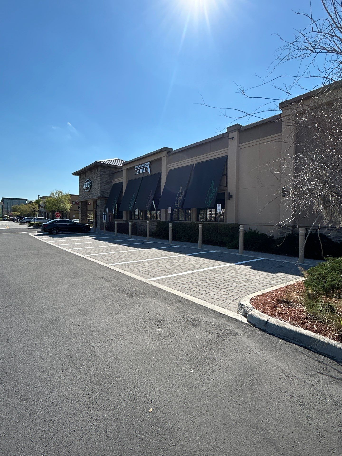 Brighter, Safer, Better: ABC Fine Wine & Spirits Parking Lot Makeover by Everline Coatings & Services - Southwest FL