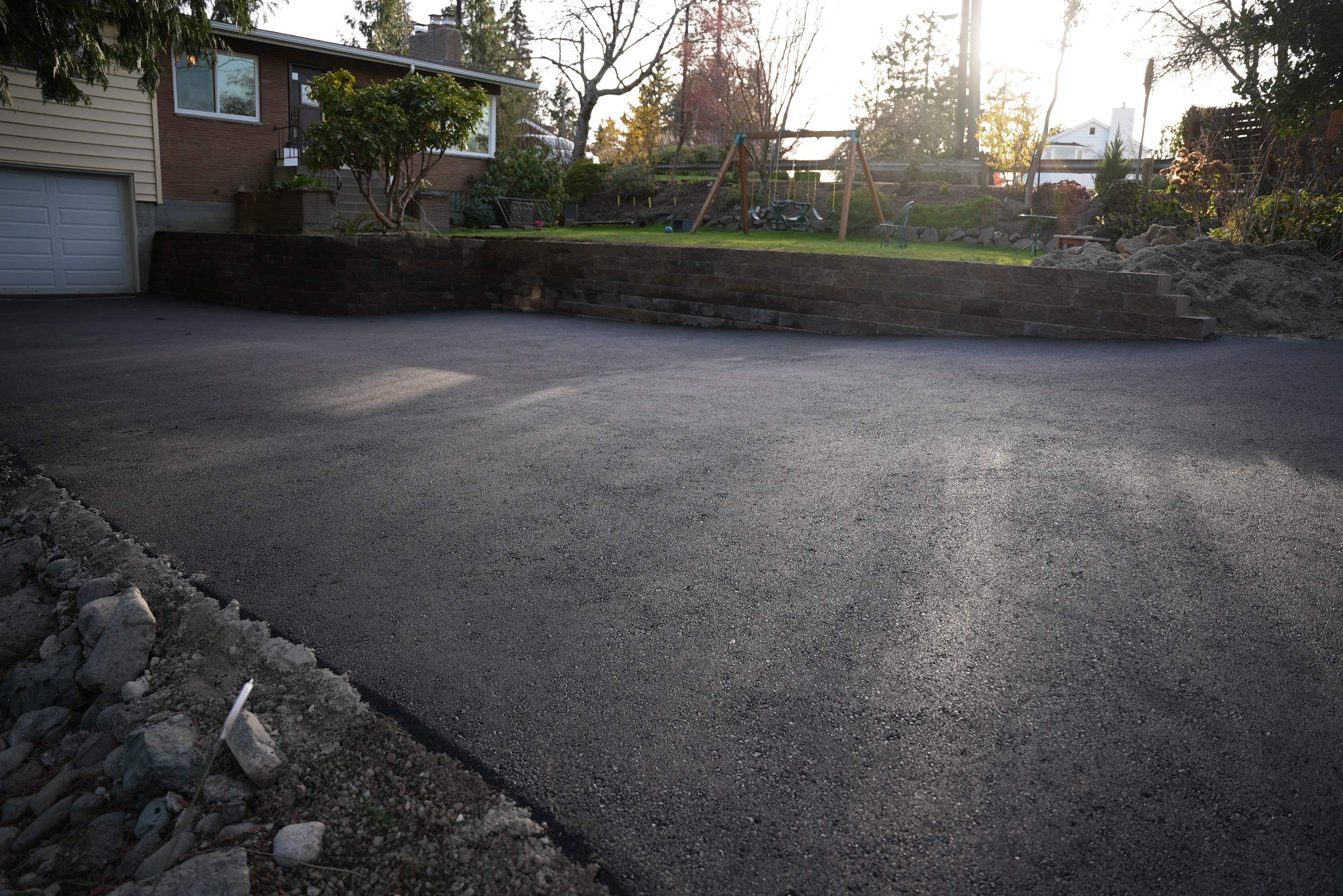Lorra | Asphalt Driveway Repair & Retaining Wall by Jireh Asphalt & Concrete Inc 