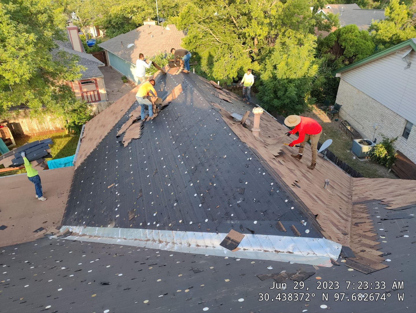 New Roof Installation Of IKO Dynasty Color Brownstone by DeZign Roofing & Exteriors