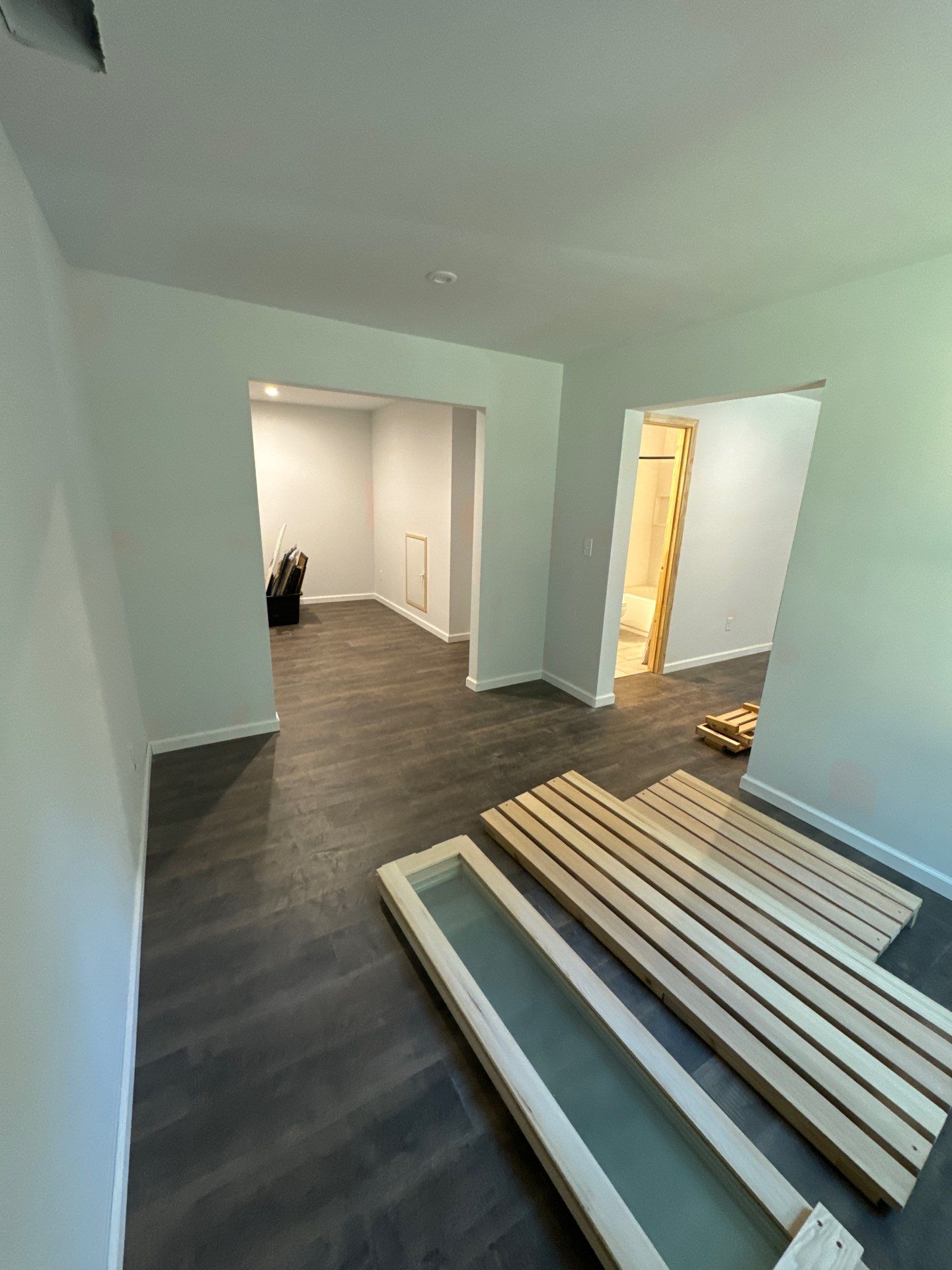Finished Basement in Acworth Featuring a Full Bathroom and Bar by Swift Home Renovations