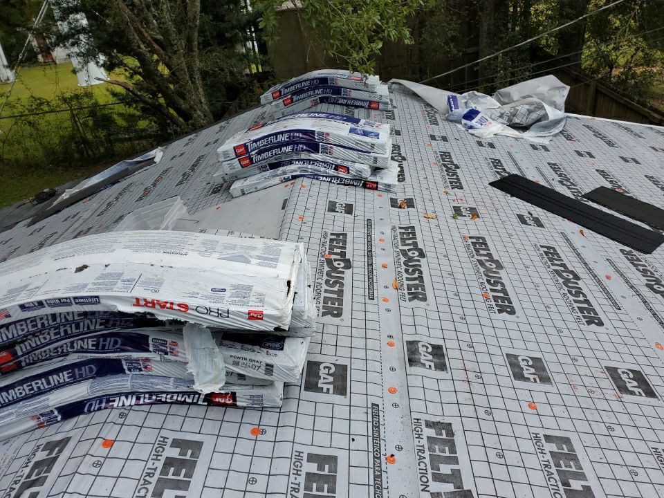 Residential Roofing Installation using Roof Replacement by American Roofing & Construction LLC