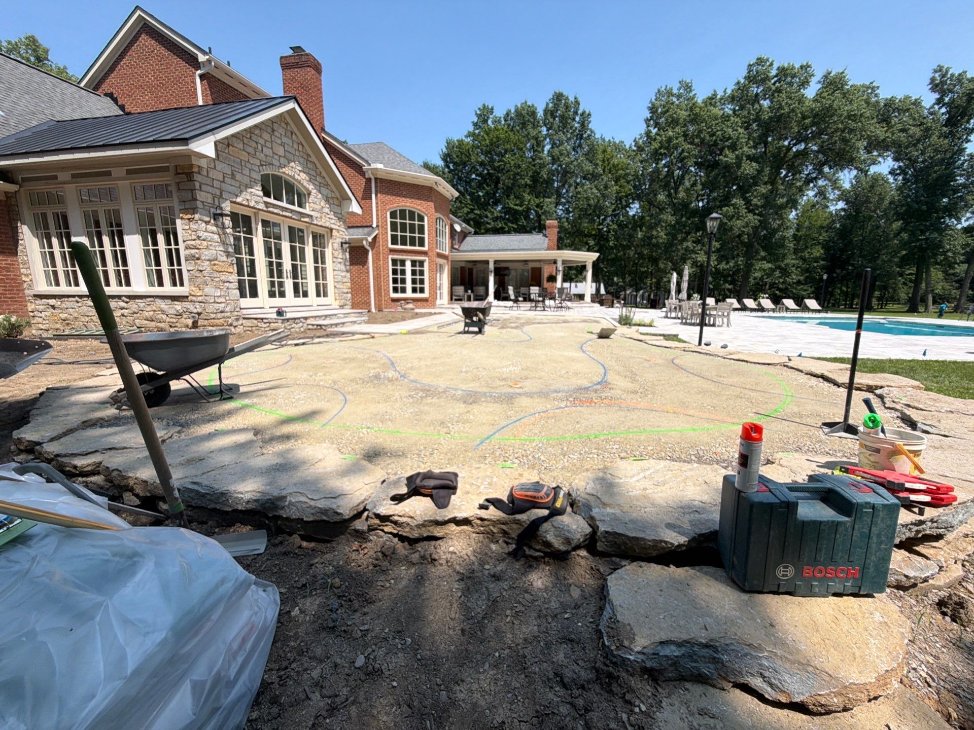 Custom Backyard Golf Green Accented by Flagstone Border in Morrow, OH by Southwest Greens Midwest