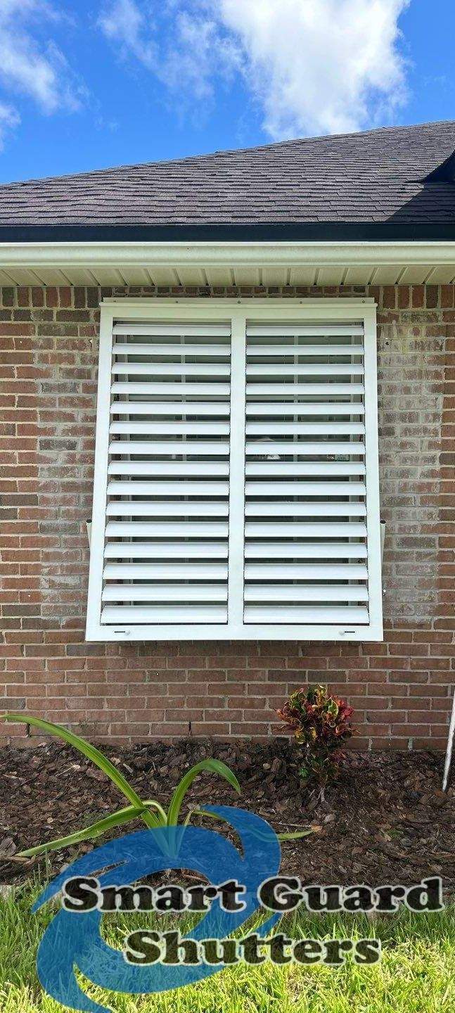 Impact Bahama Shutters in Signal White by Smart Guard Shutters
