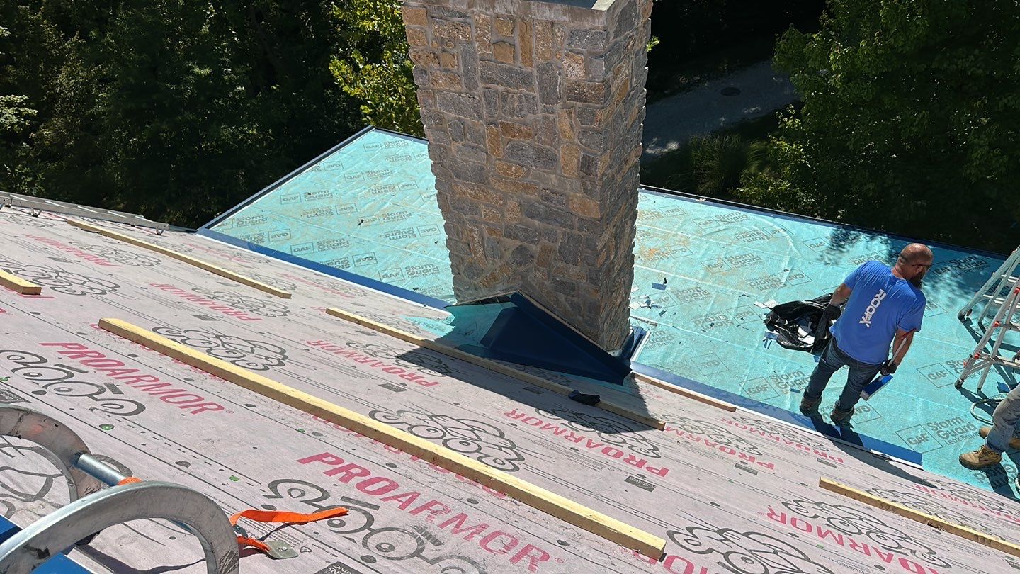 Residential Roofing Installation using Standing Seam Metal - Gallery Blue by RoofX 