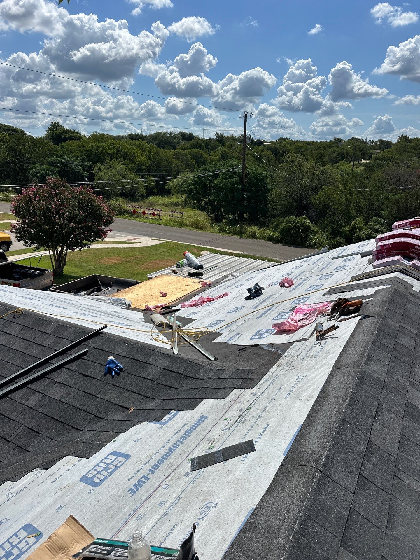 Residential Roofing Installation using Owens Corning Oakridge Onyx Black by DeZign Roofing & Exteriors
