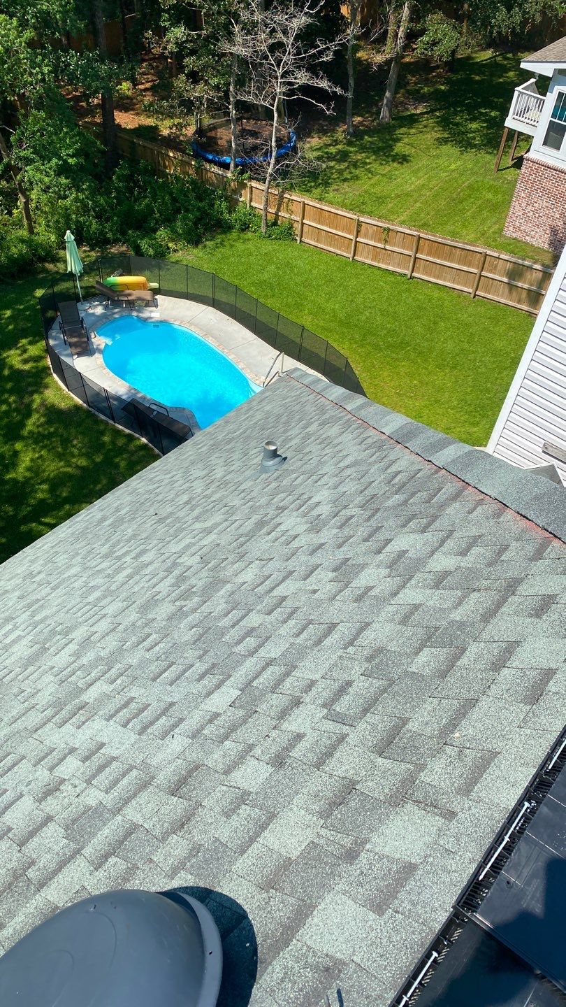 Residential Roofing Installation using Roof Replacement by American Roofing & Construction LLC