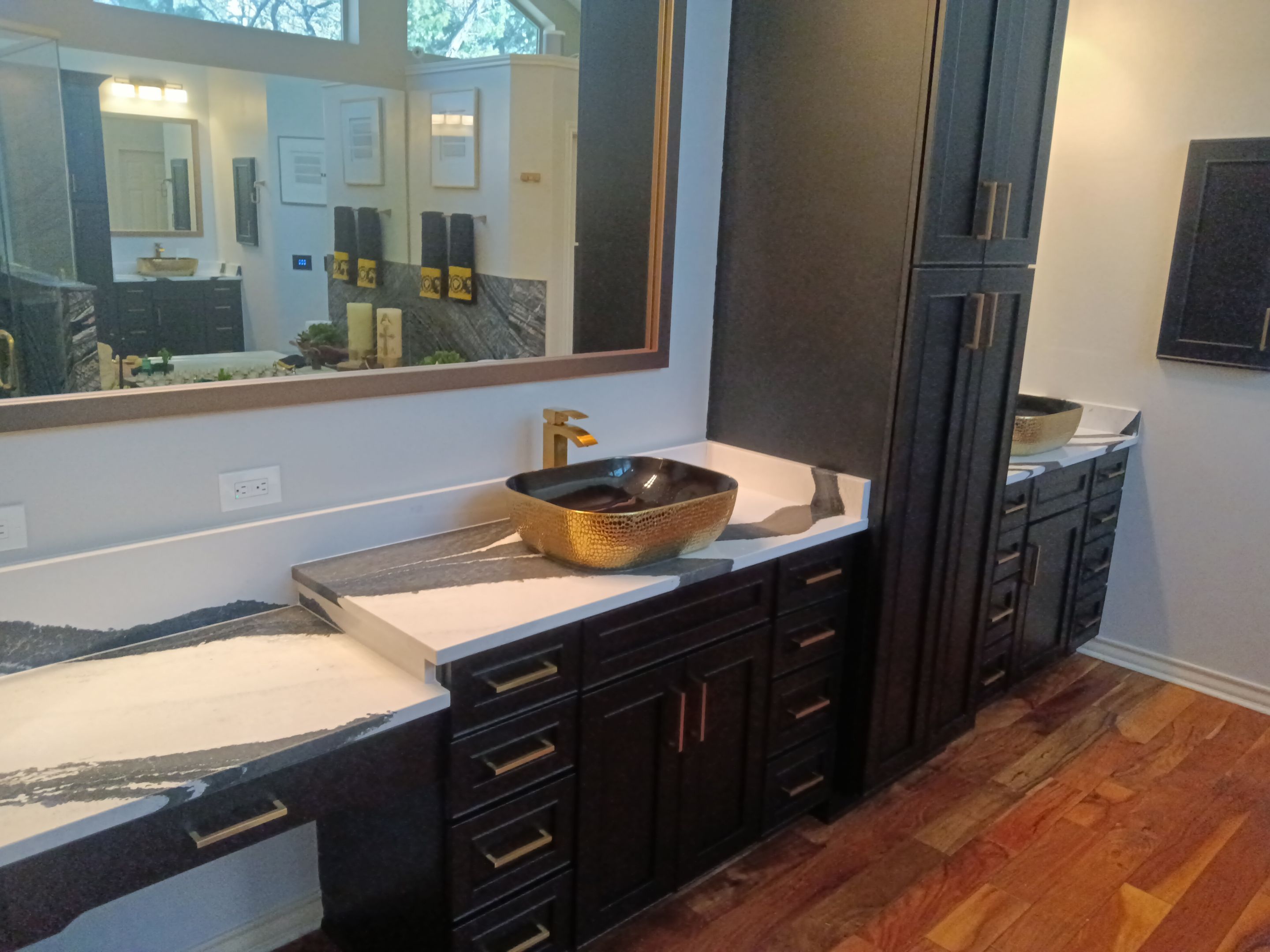 Bookmatched Natural Stone Shower by Legacy Bath and Kitchen 