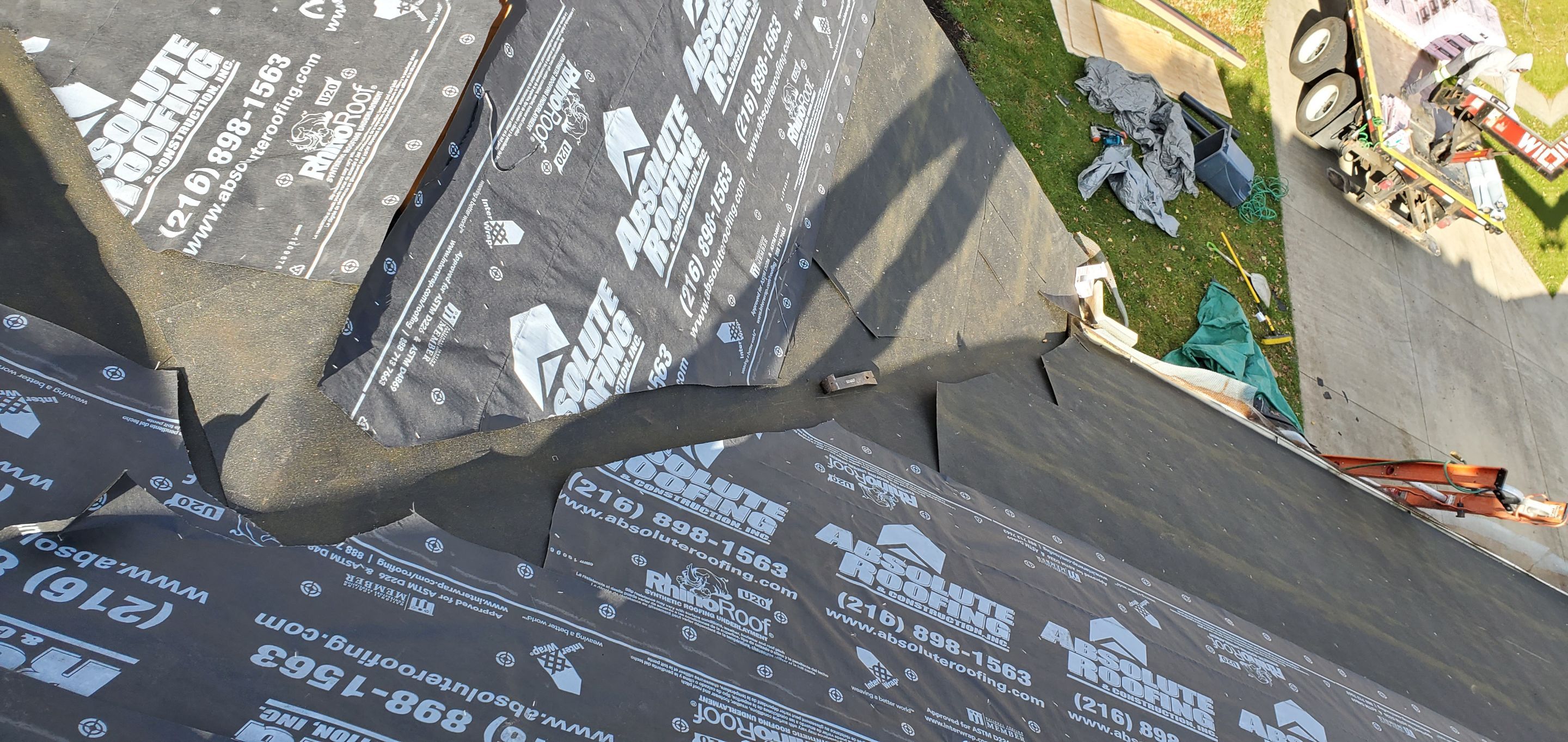 James Hardie Siding  using James Hardie Board and Batten, White by Absolute Roofing and Construction