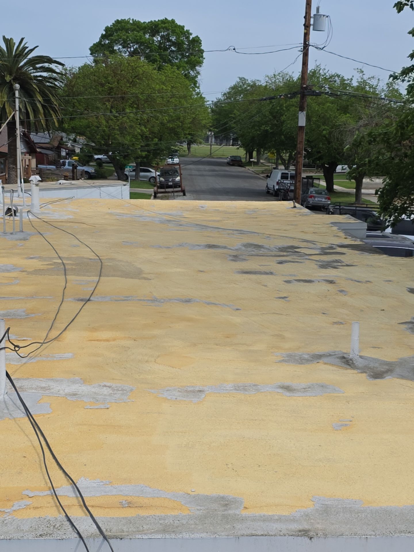 Foam Refurbish using Conklin Benchmark/PUMA XL coatings and spray foam by Straight Edge Roofing Inc