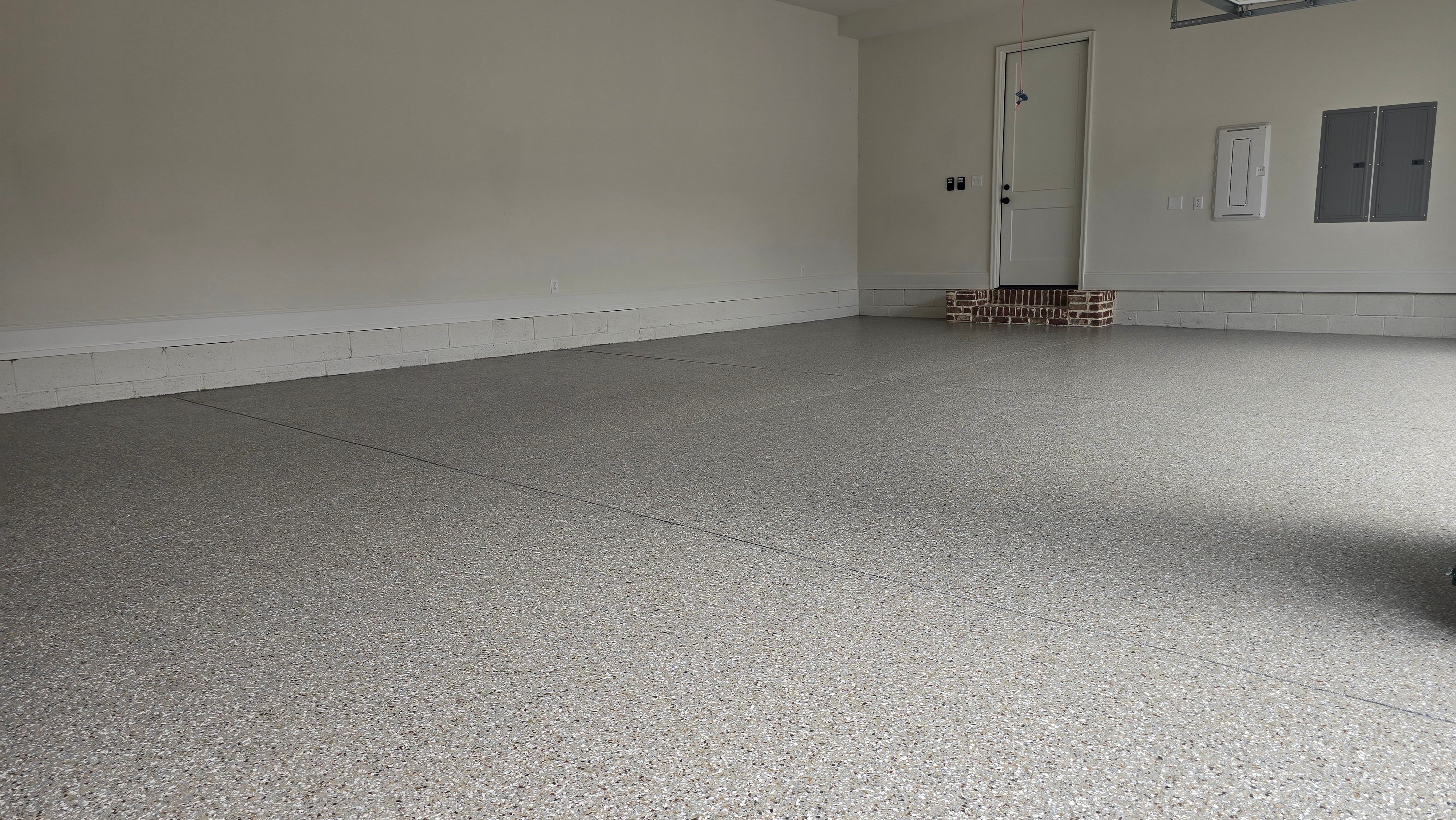 Garage Using Creekbed  by Elite Floor Solutions