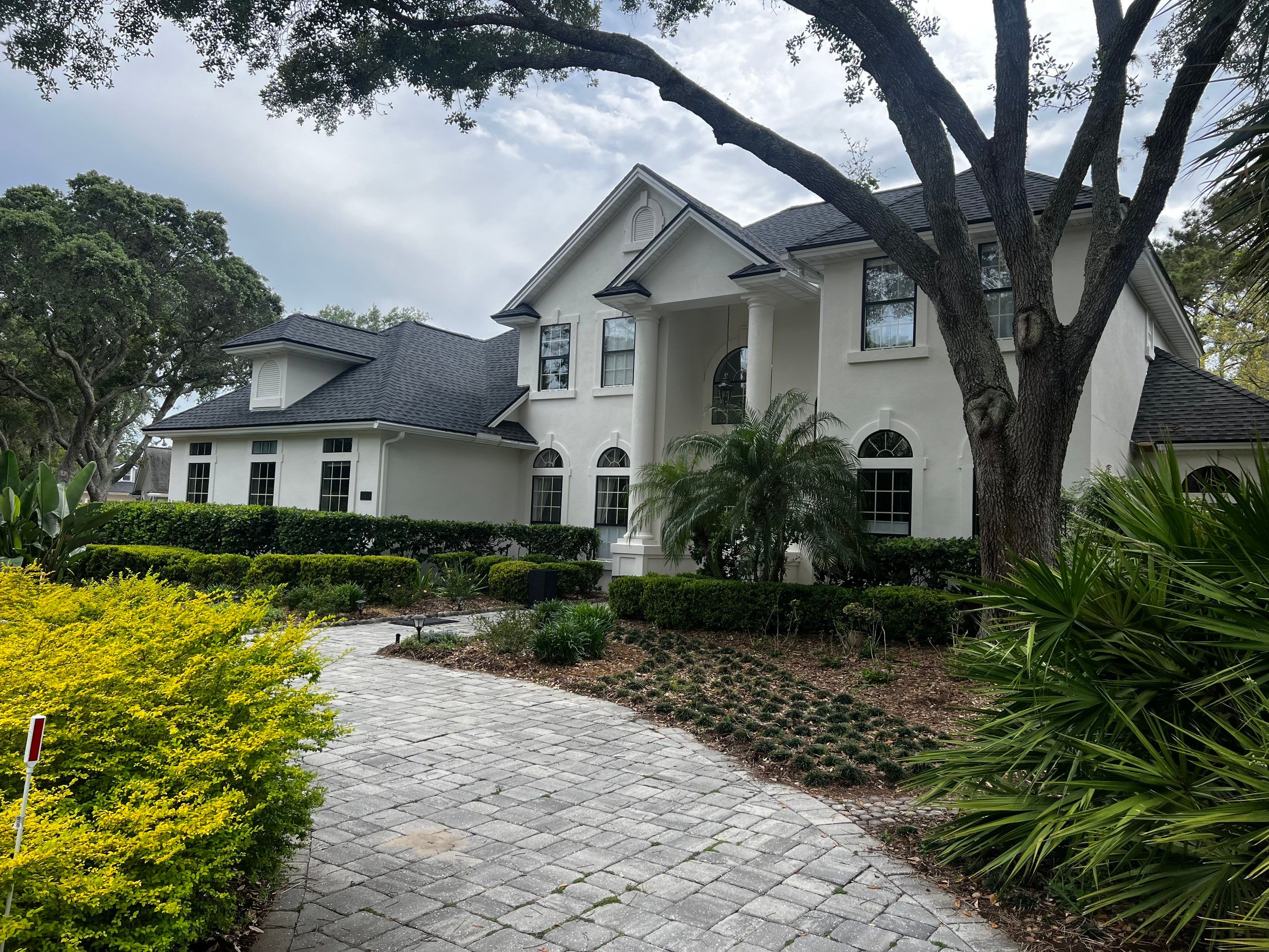 Large Stucco Home Exterior Painting in Marsh Landing | Ponte Vedra Beach, FL by A New Leaf Painting, LLC