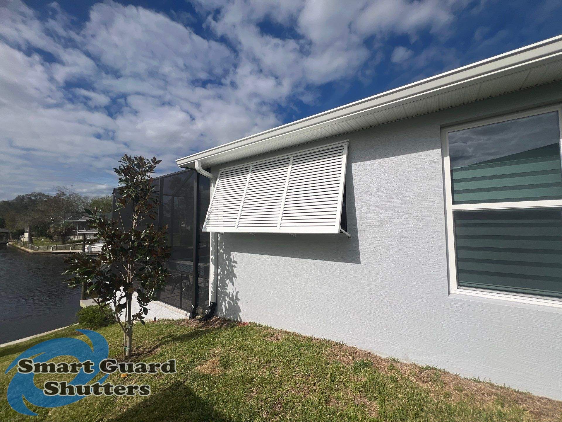 Decorative Bahamas in Signal White by Smart Guard Shutters