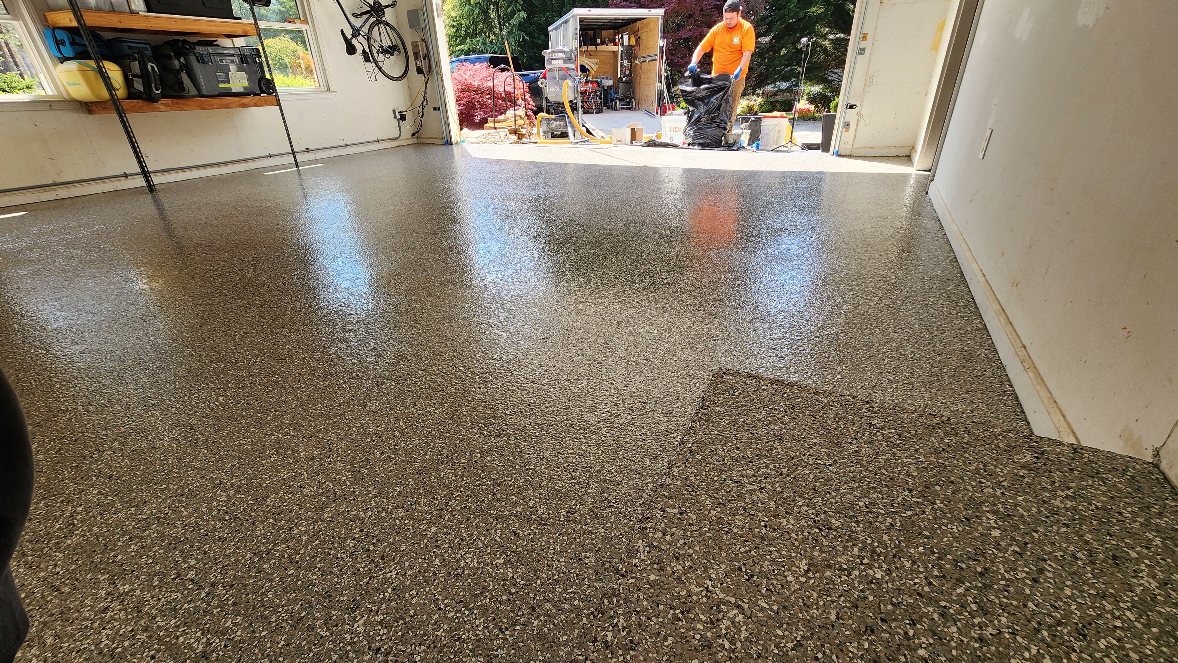 Garage floor transformation with Creekbed flake by Opus Renovations 