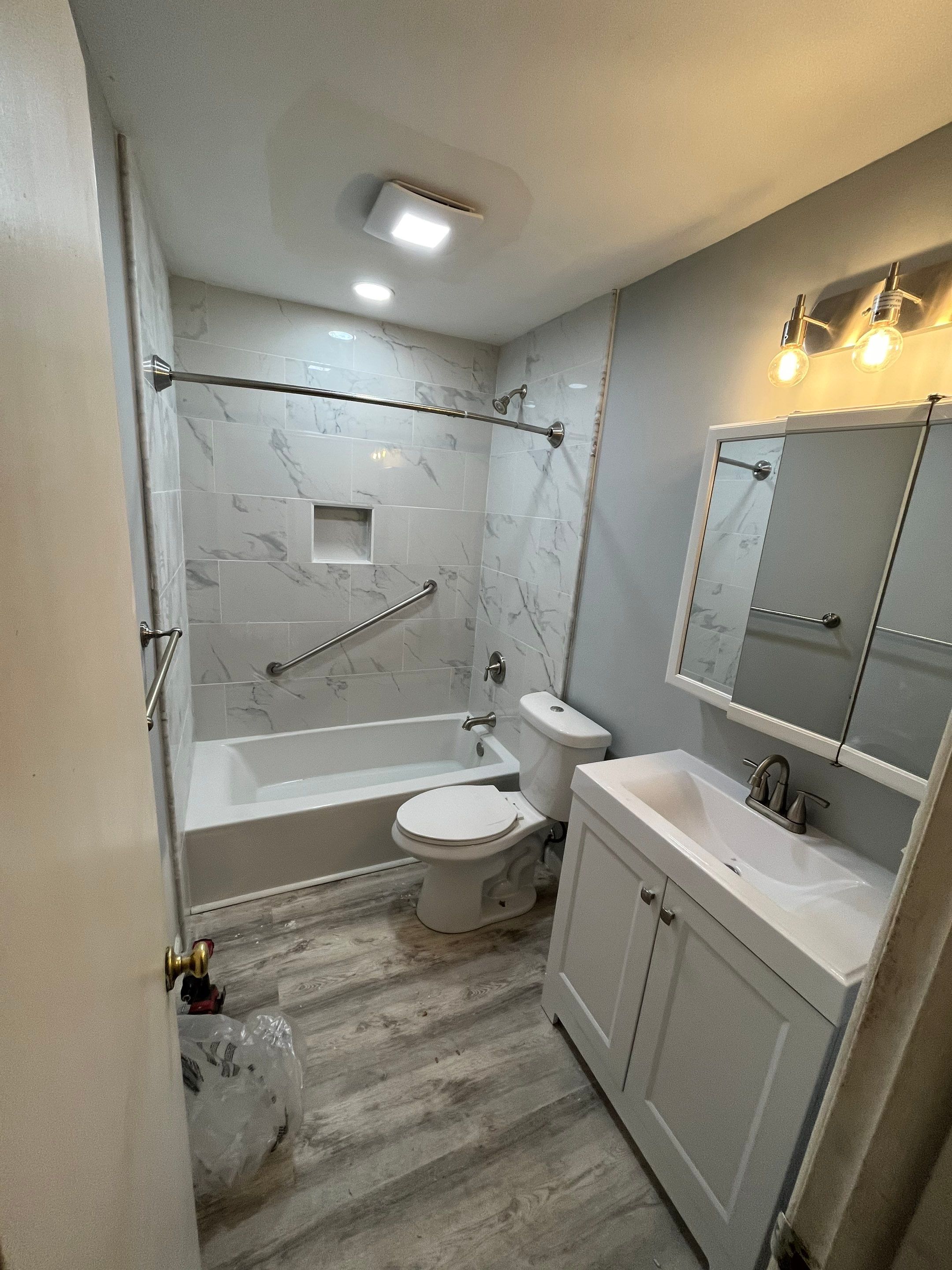 Bathroom Remodel using Tile by Home Concepts Construction